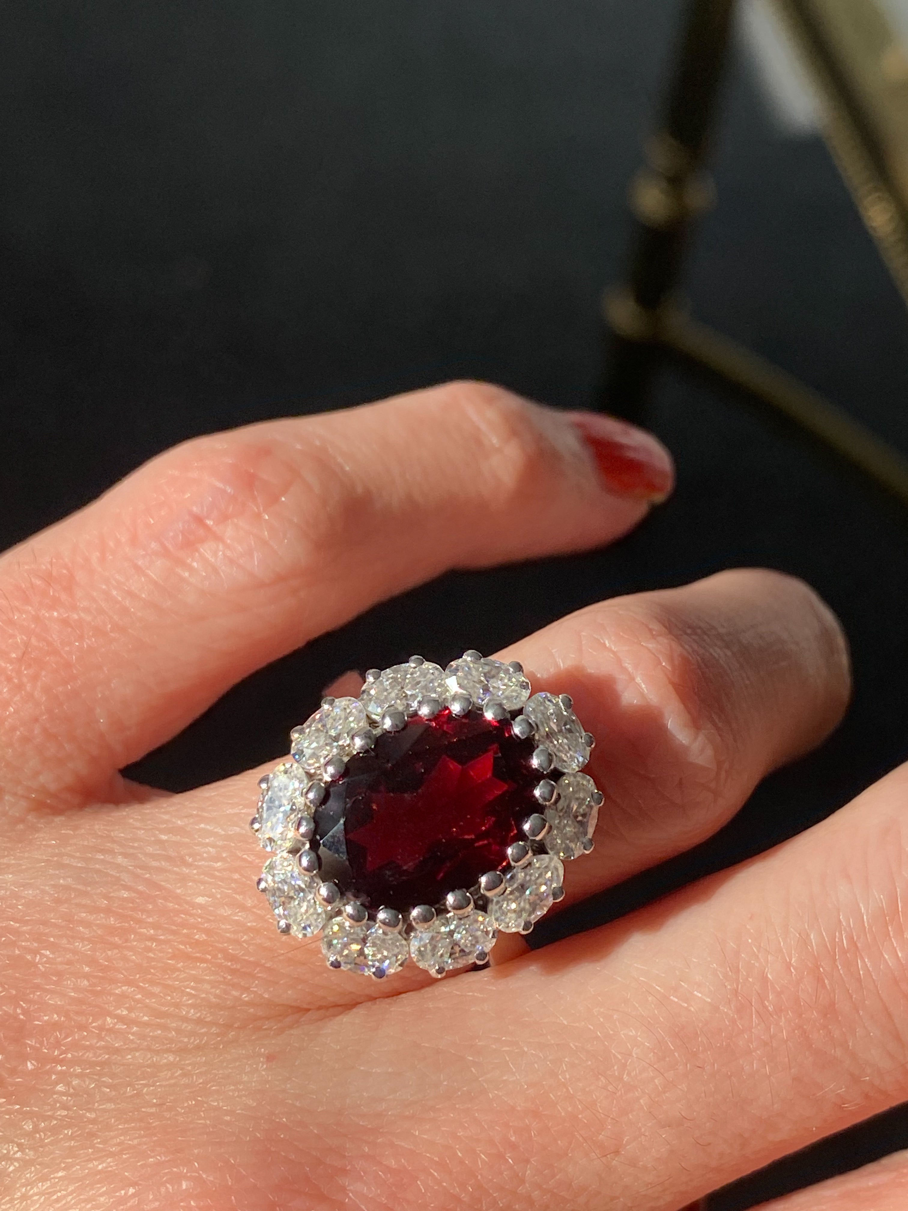 7.25 CTW Oval Cut Garnet and Moissanite Halo Cocktail Ring in Sterling Silver