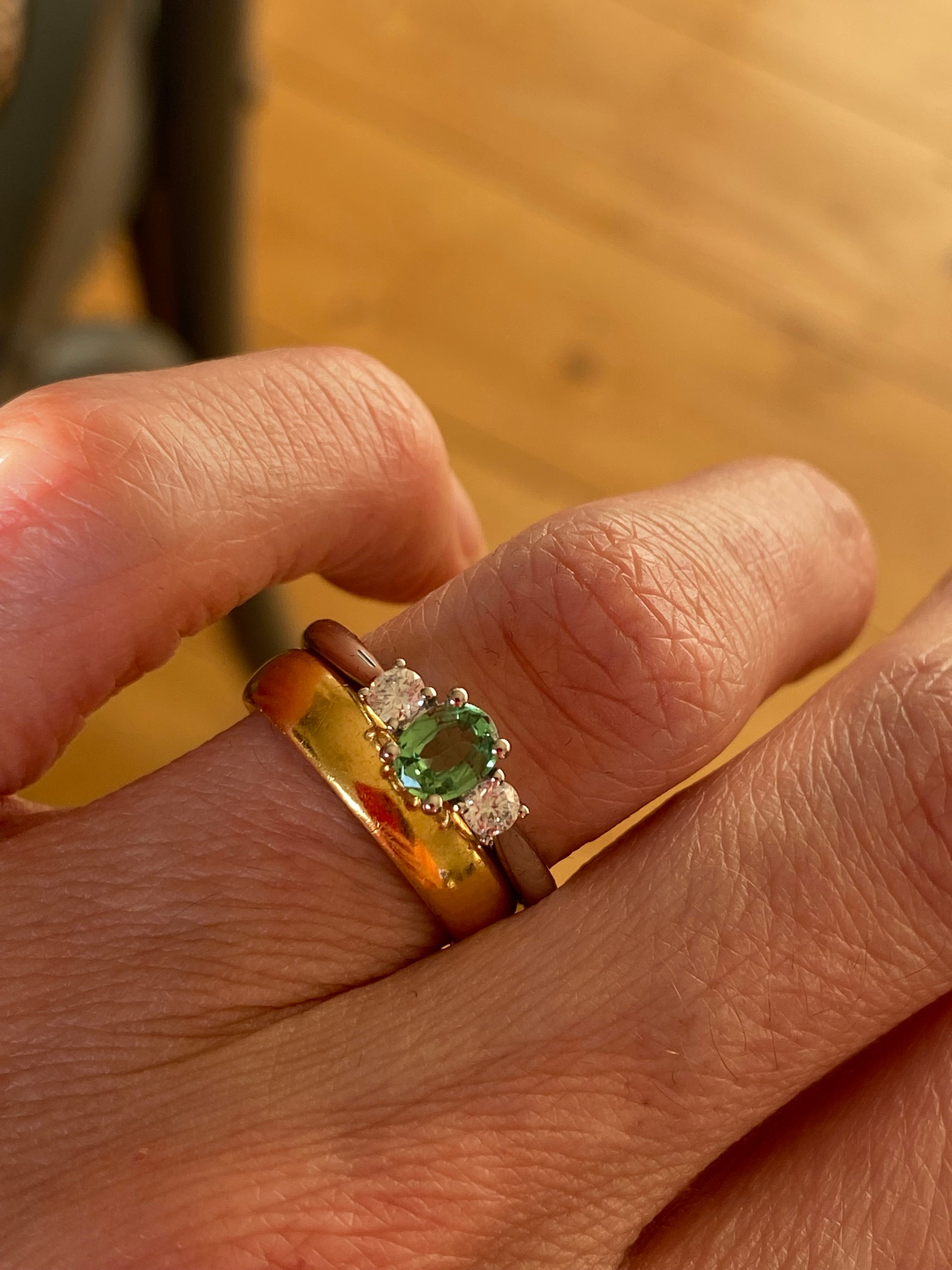 0.40 Carat Tsavorite Garnet and 0.20 Carat Diamond Three Stone Engagement Ring in Platinum