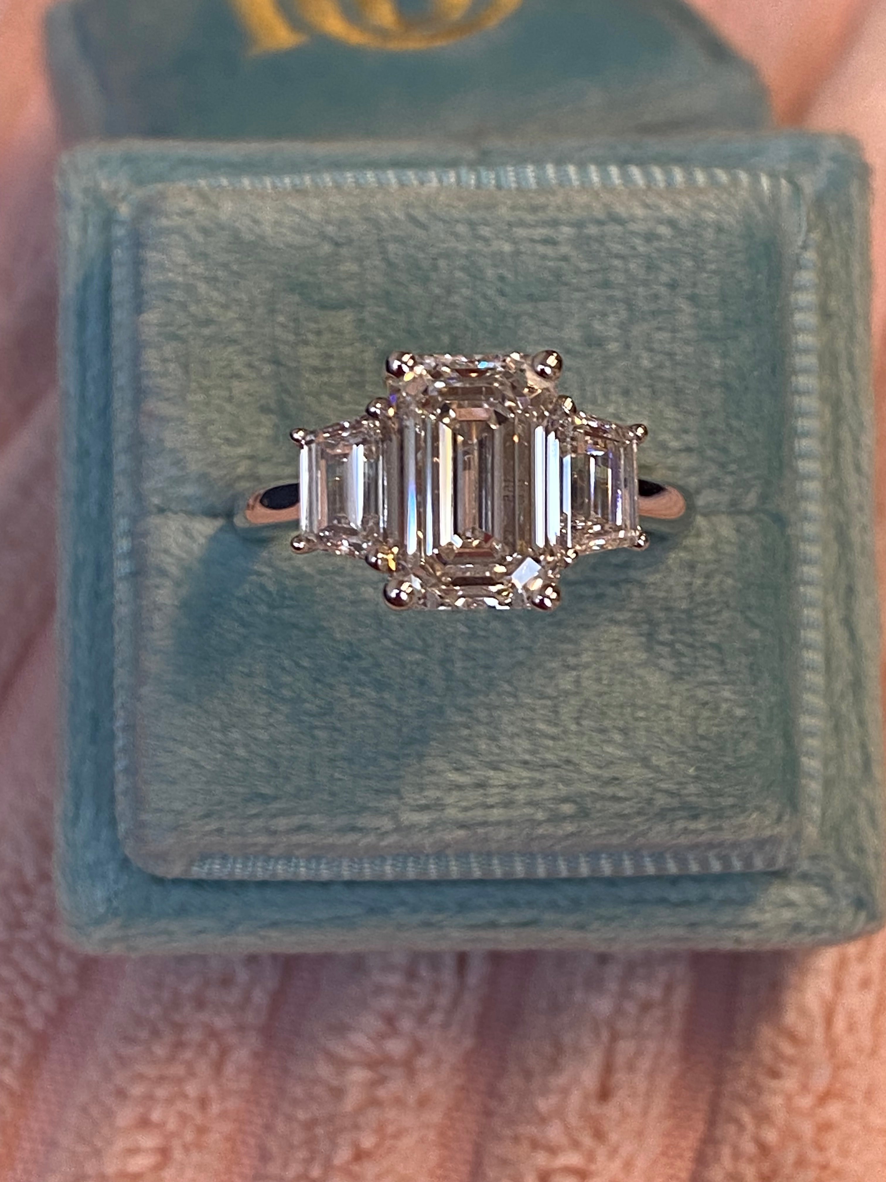 3.93 CTW Emerald and Trapezoid Cut D Colour VS1 Lab Diamond Three Stone Ring in Platinum