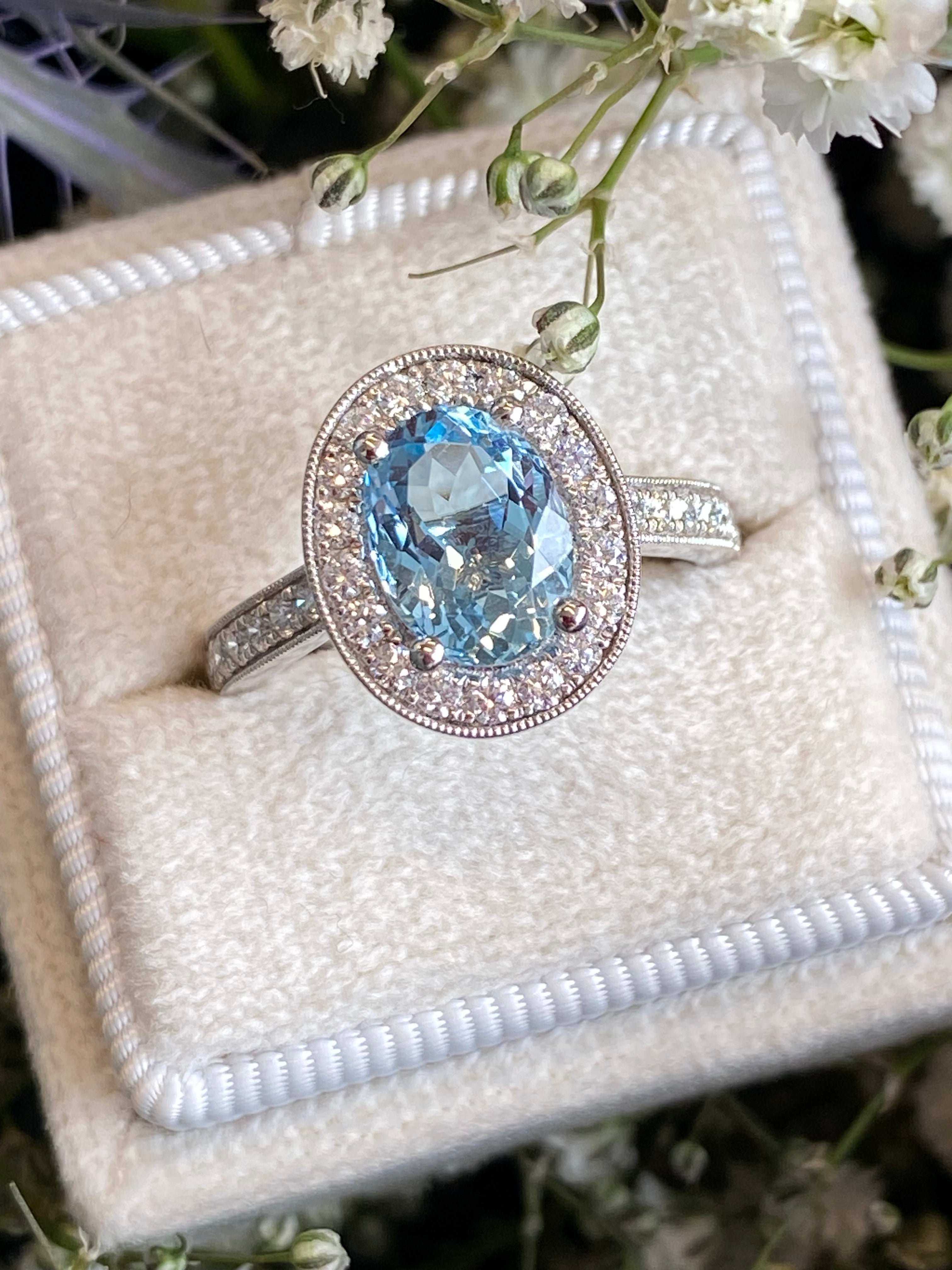 2.33 CTW Oval Cut Aquamarine and Natural Diamond Halo Engagement Ring in 18ct White Gold