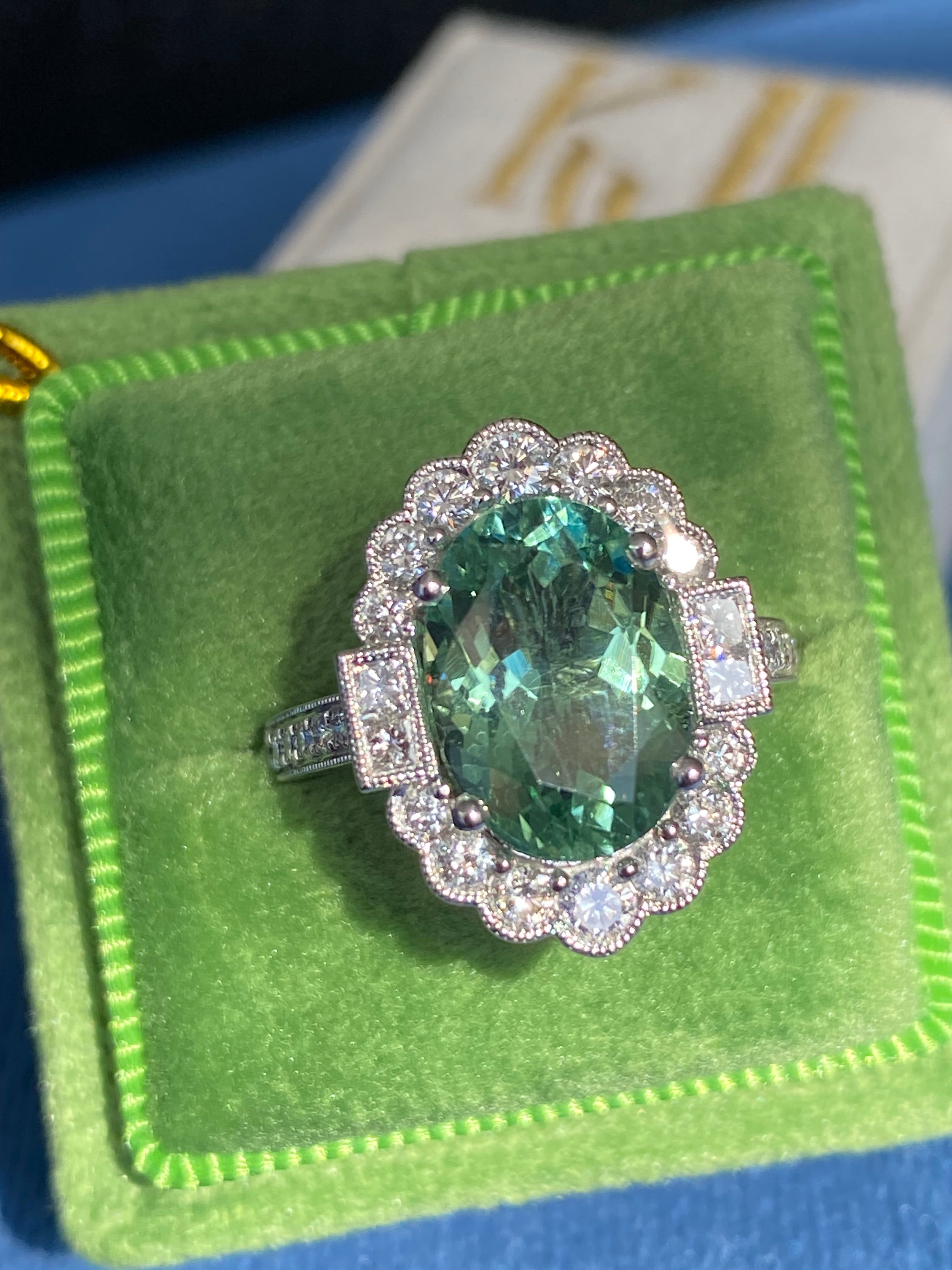 4.07 Carat Oval Cut Mint Tourmaline and 0.80 CTW Natural Diamond Ring in Platinum
