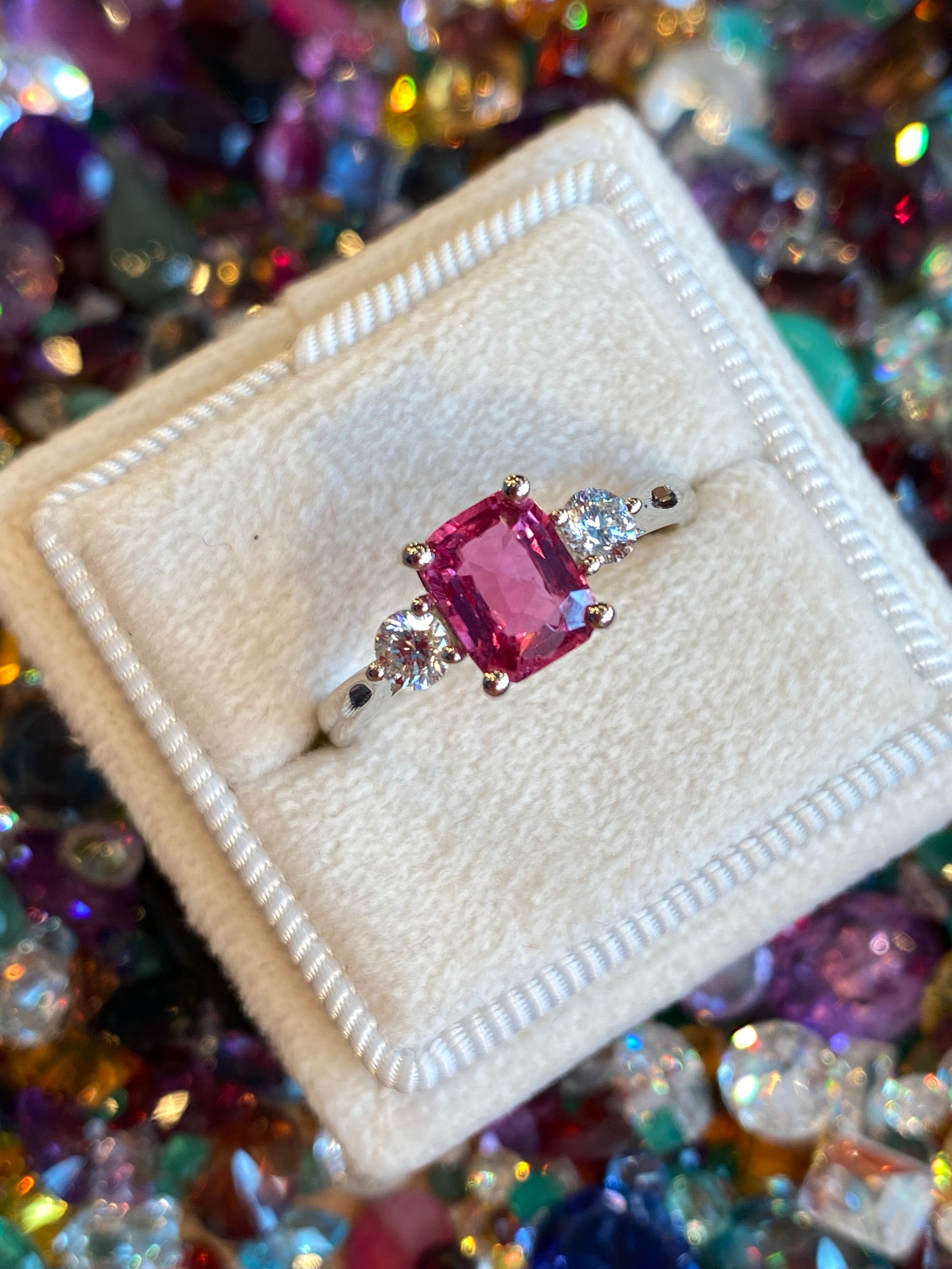 1.52 CTW Cushion Cut Ruby and Natural Diamond Three-Stone Engagement Ring in Platinum