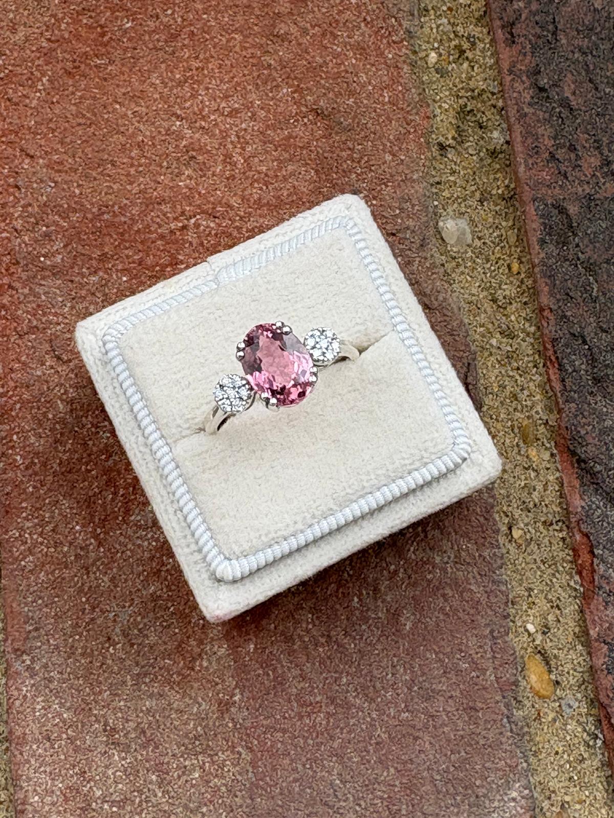 2.05 Carat Pink Tourmaline and Moissanite Three Stone Style Ring in Sterling Silver