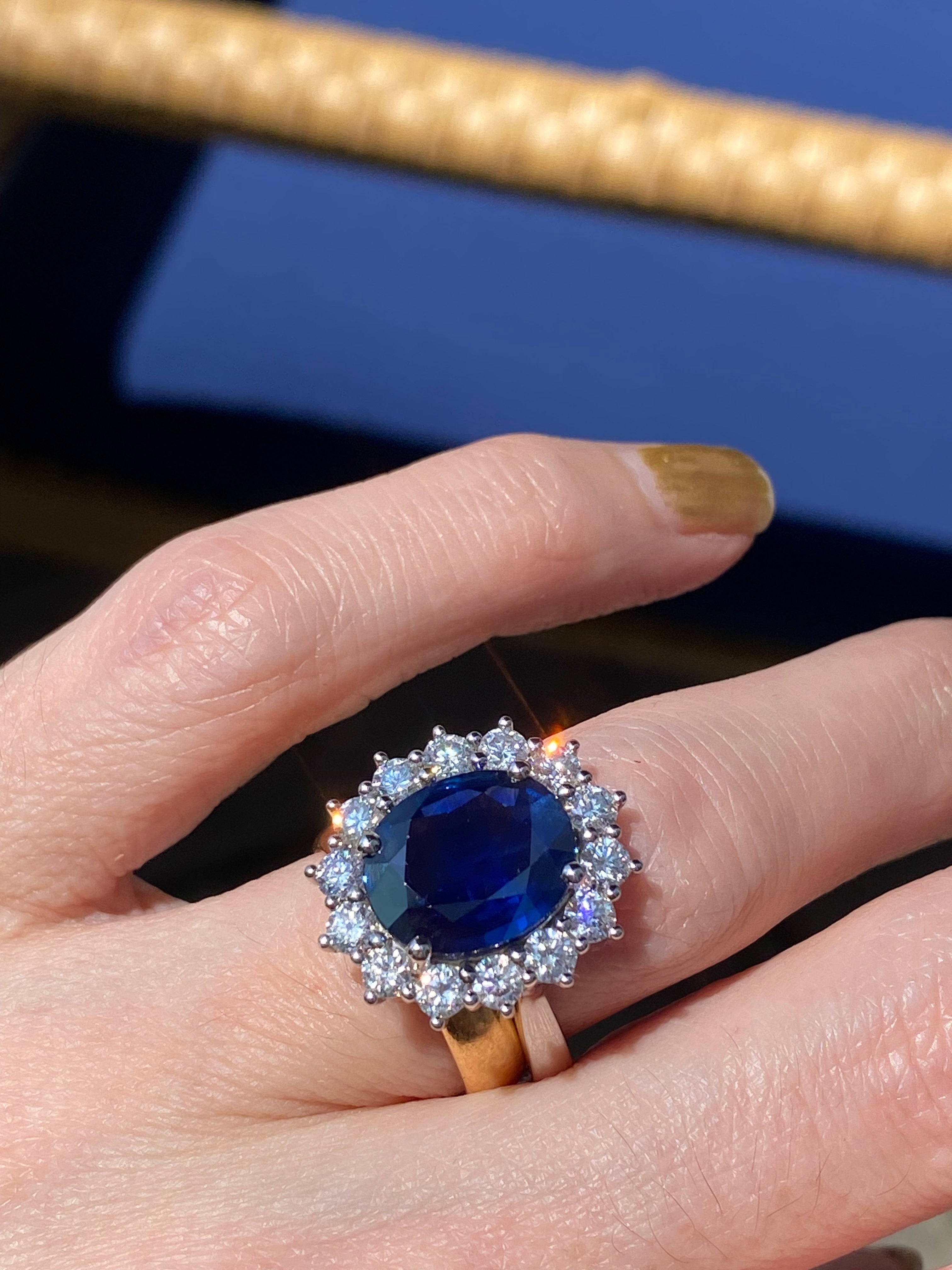 4.73 Carat Blue Ceylon Sapphire and 1.35 CTW Natural Diamond Halo Ring in Platinum