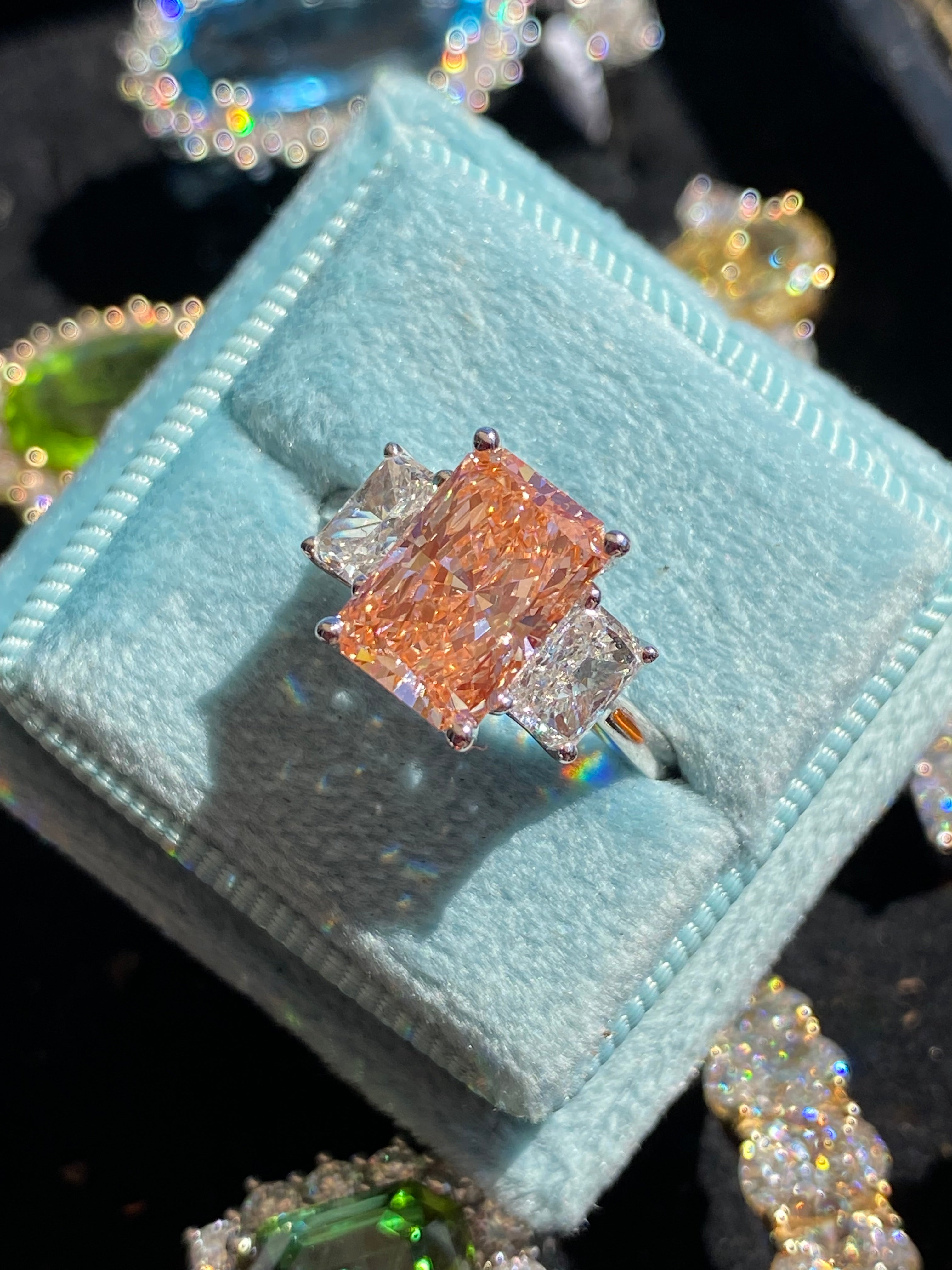 4.12 CTW Fancy Radiant Cut Pink Lab Grown Diamond Graduated Three Stone Ring in Platinum