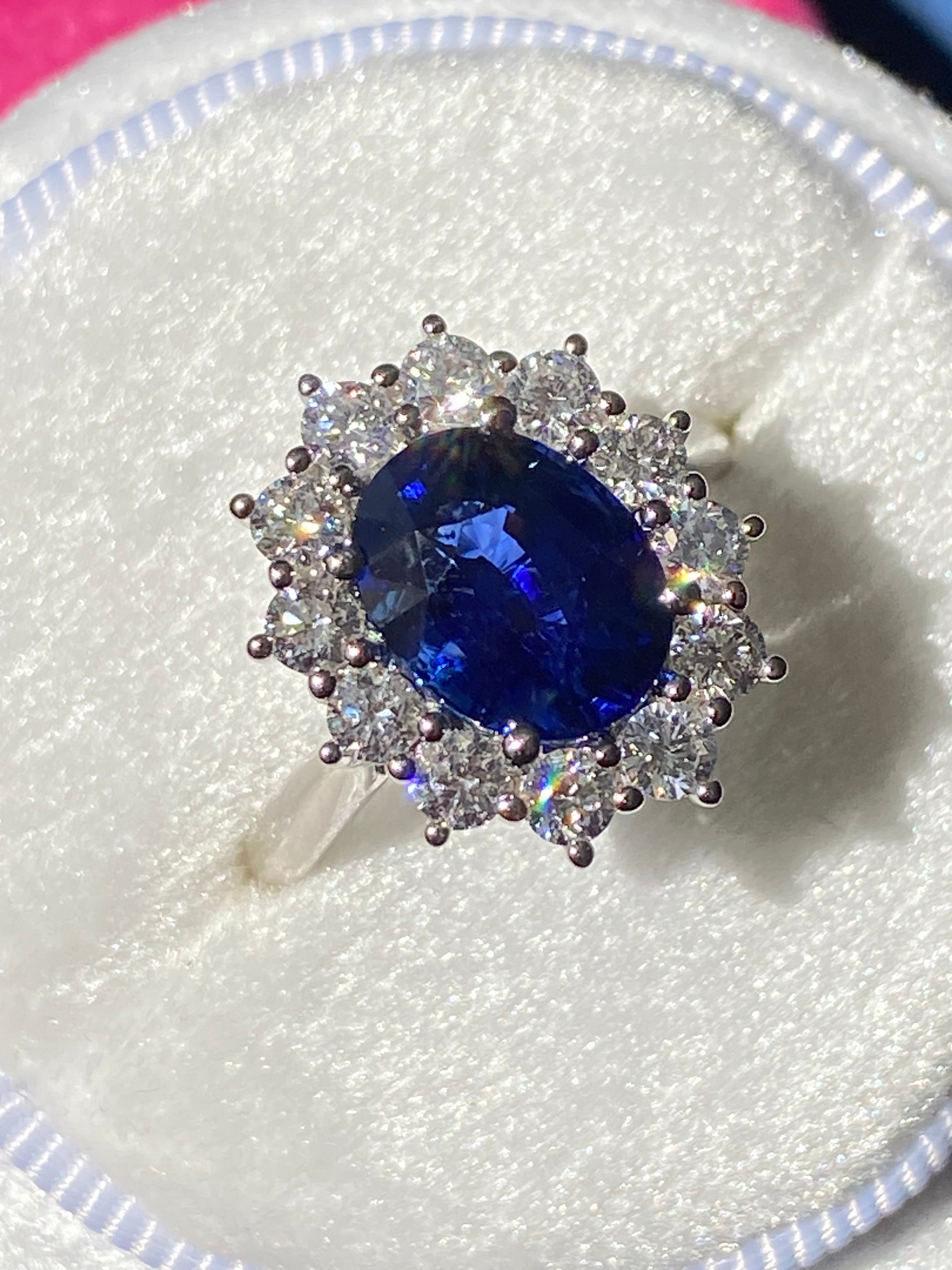 3.17 Carat Blue Ceylon Sapphire and 0.87 CTW Natural Diamond Halo Ring in Platinum