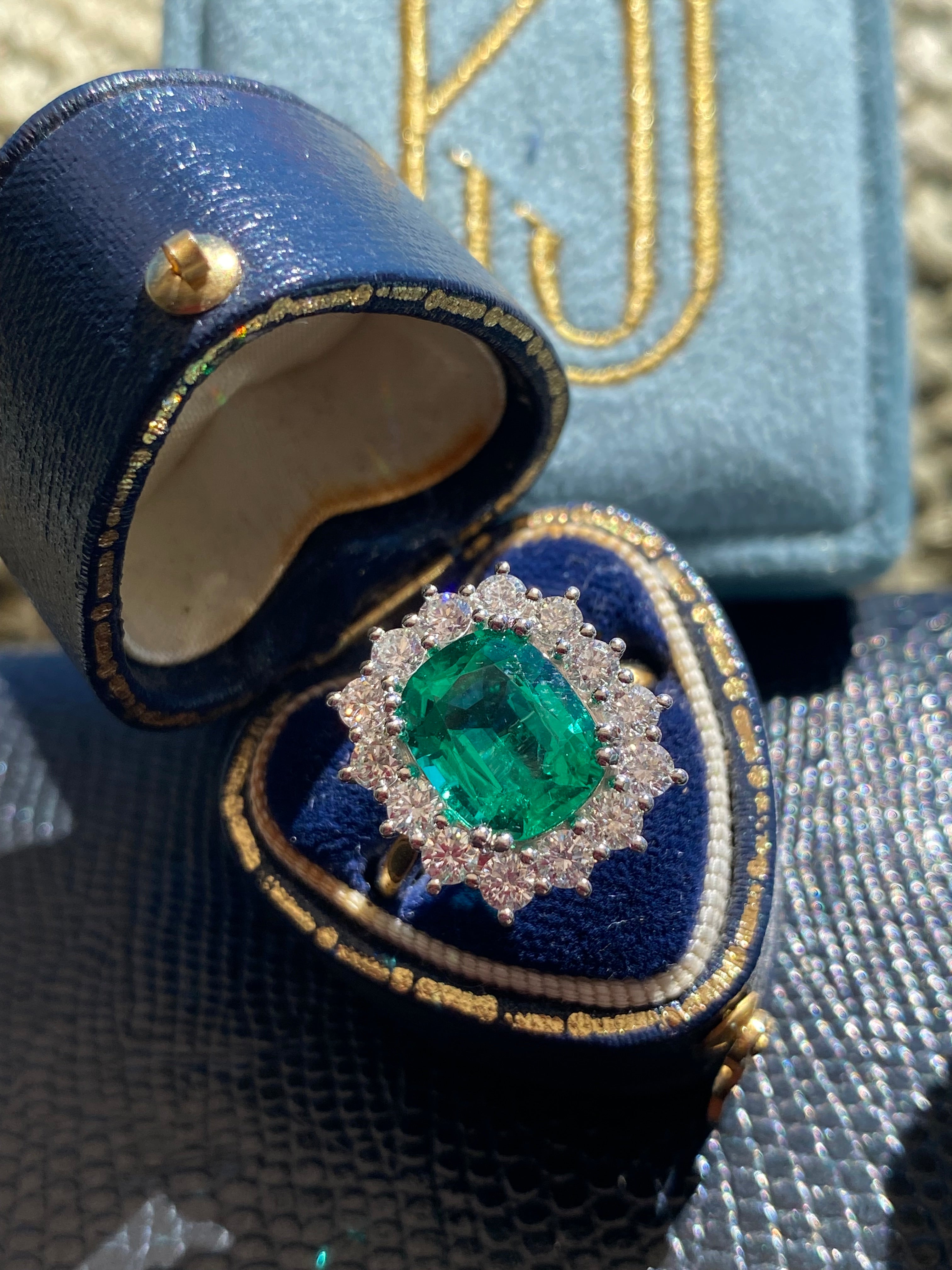 2.58 Carat Cushion Cut GIA Zambian Emerald and 1.07 CTW Natural Diamond Halo Ring in Platinum and 18ct Yellow Gold