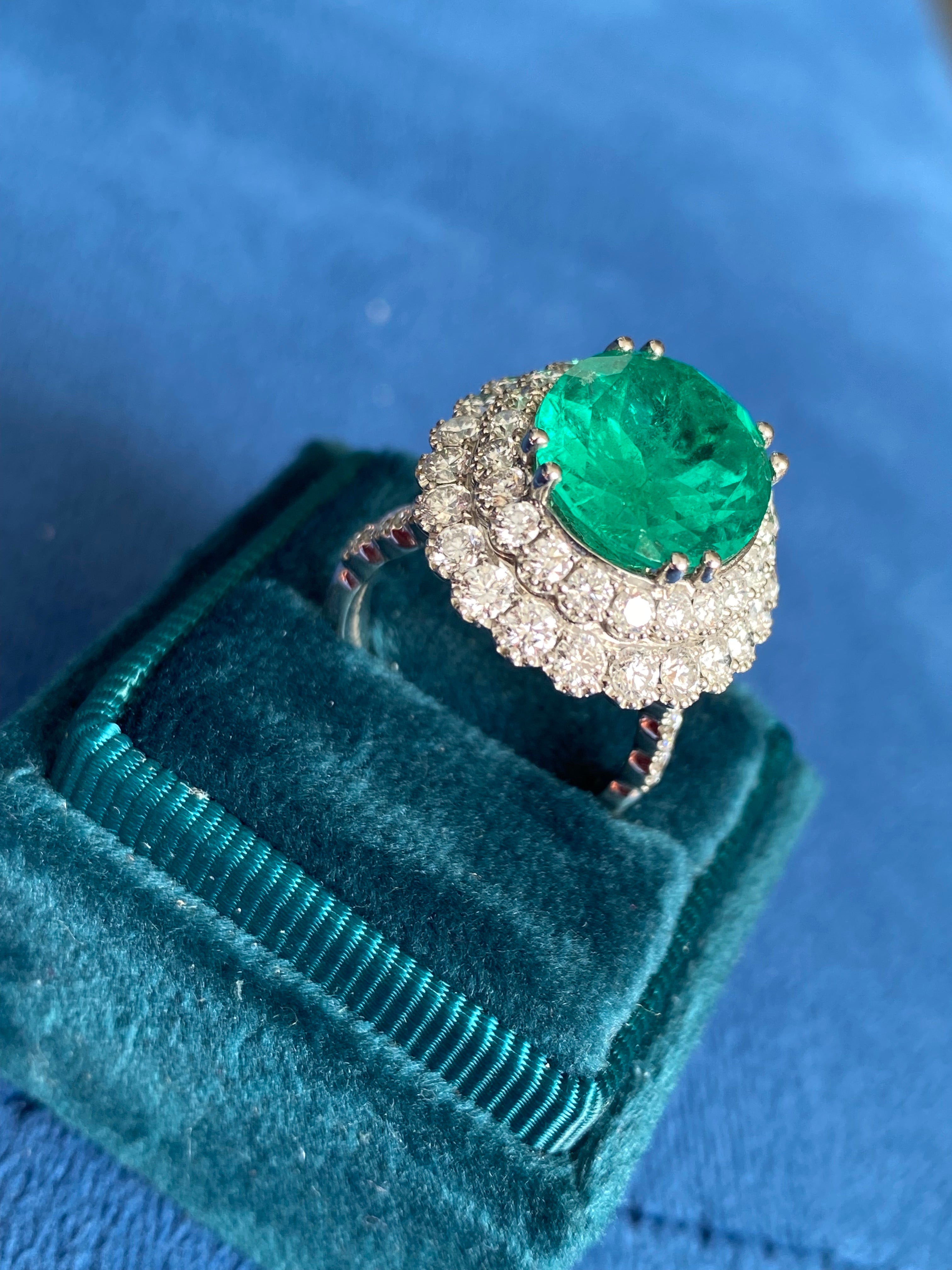 9.10 CTW Colombian Emerald and Natural Diamond Double Halo Ring in Platinum