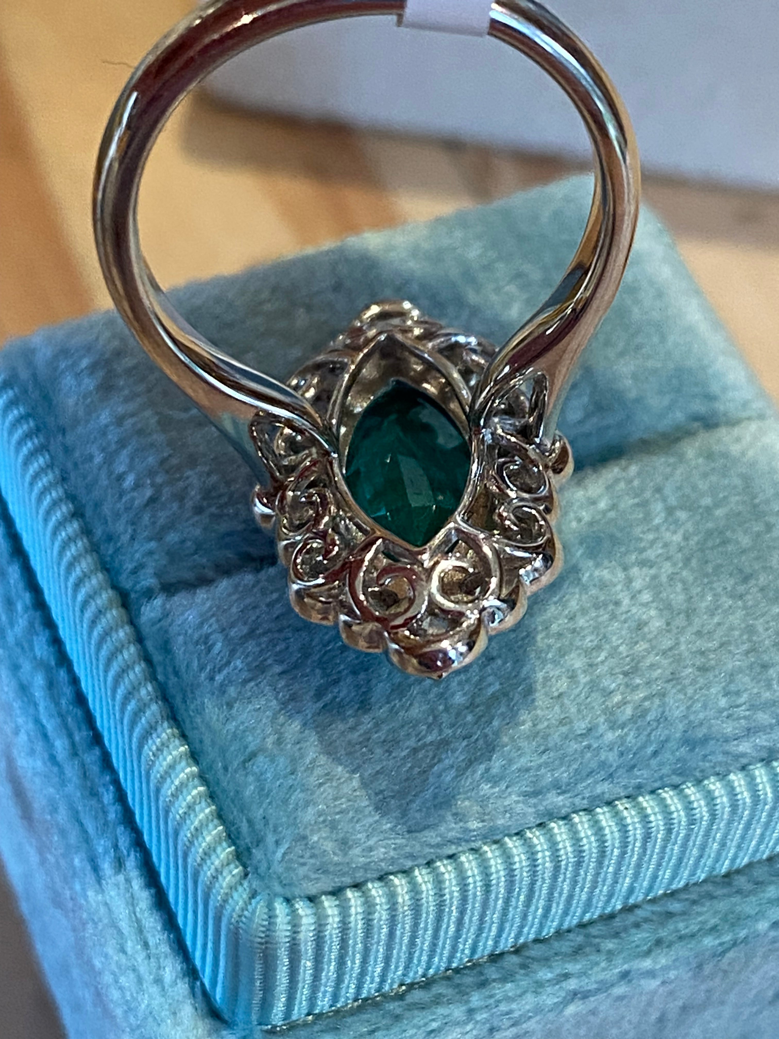 3.47 CTW Marquise Cut Emerald and Natural Diamond Halo Ring in Platinum