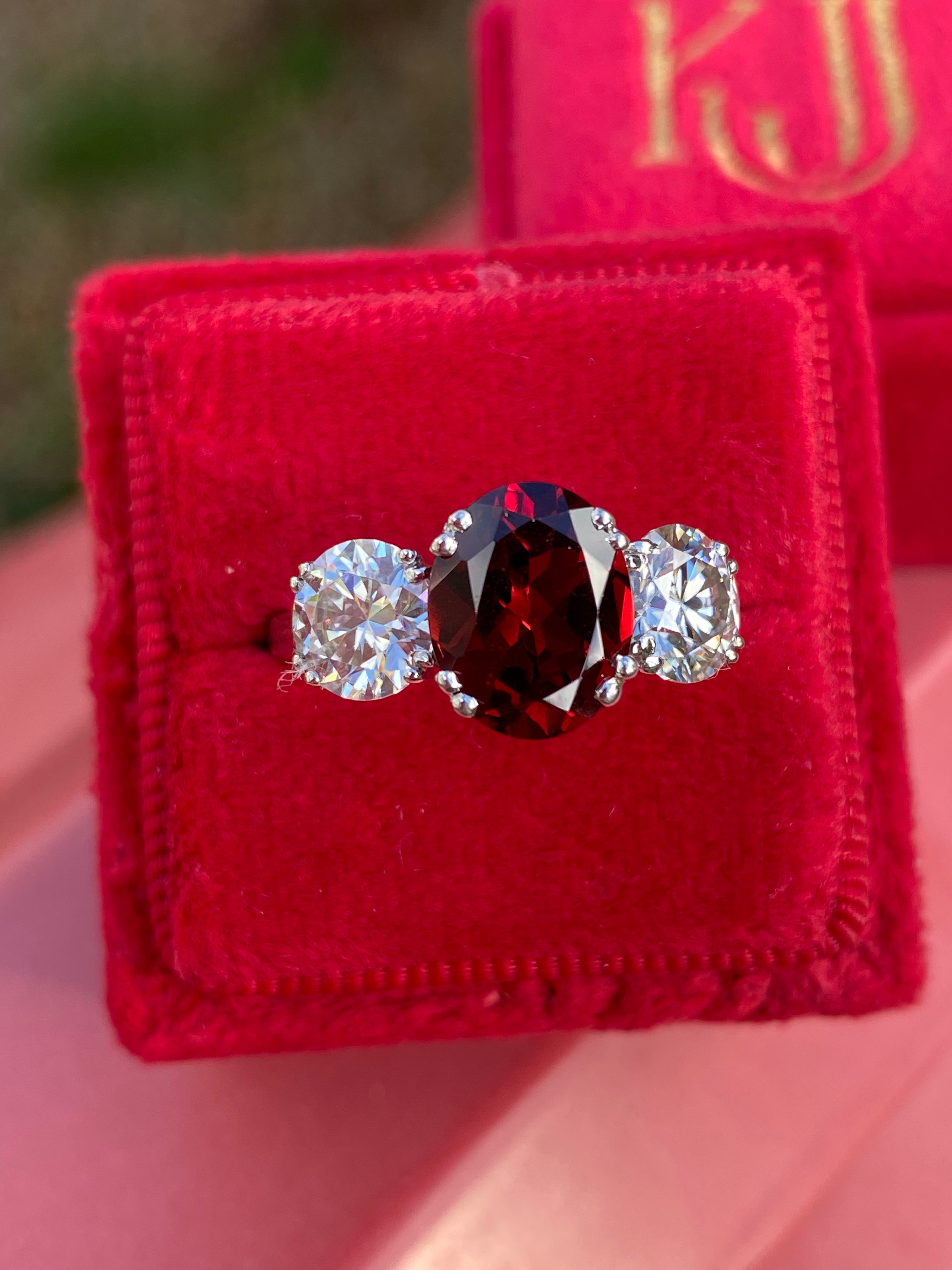 2.57 Carat Garnet and 1.84 Carat Moissanite Three Stone Ring in Sterling Silver