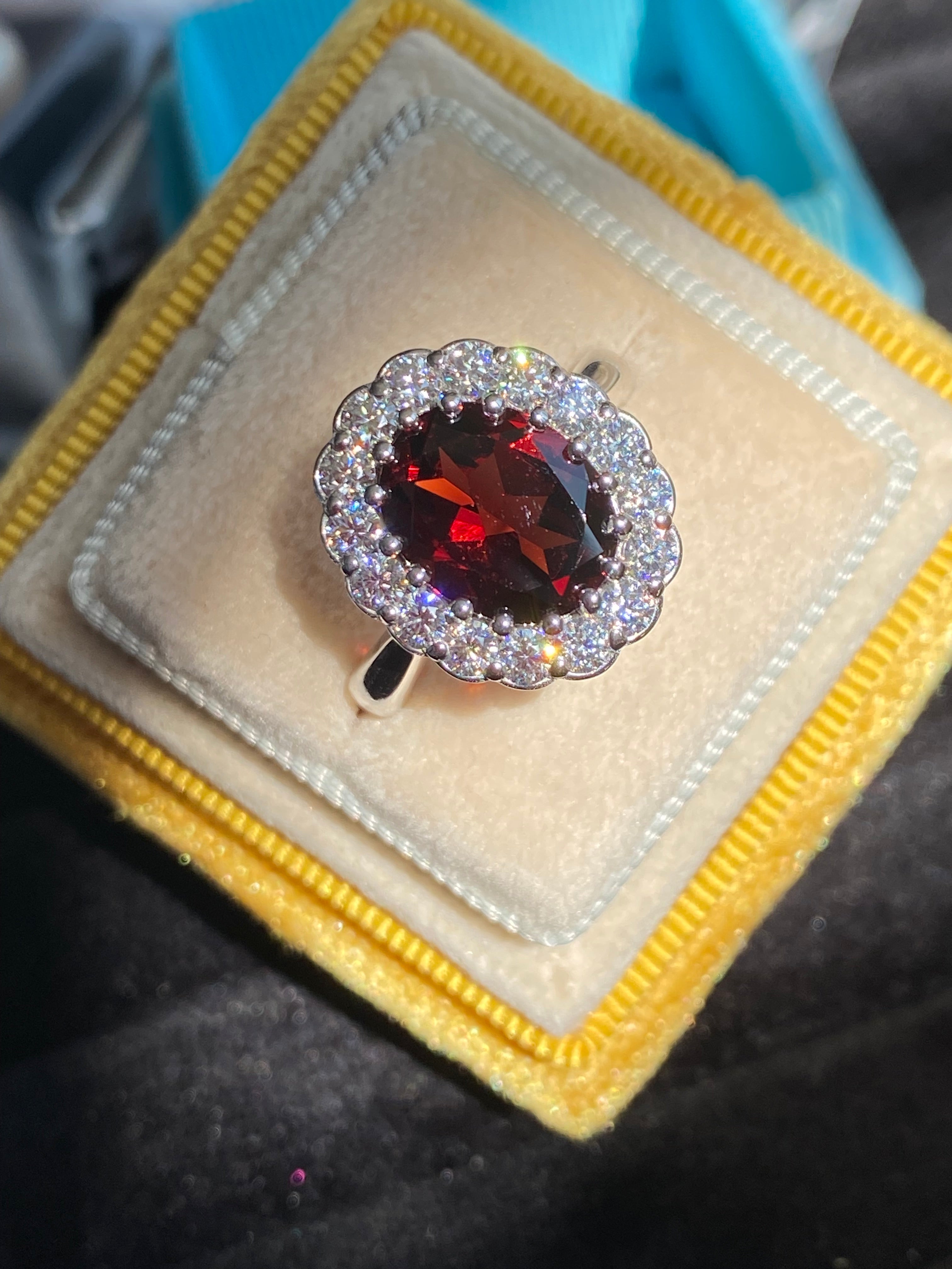 5.50 CTW Oval Cut Garnet and Moissanite Halo Cocktail Ring
