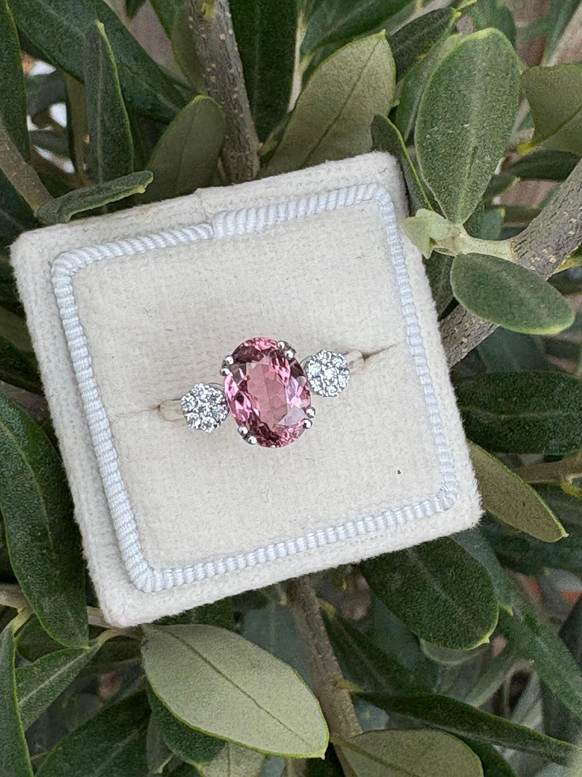 2.05 Carat Pink Tourmaline and Moissanite Three Stone Style Ring in Sterling Silver