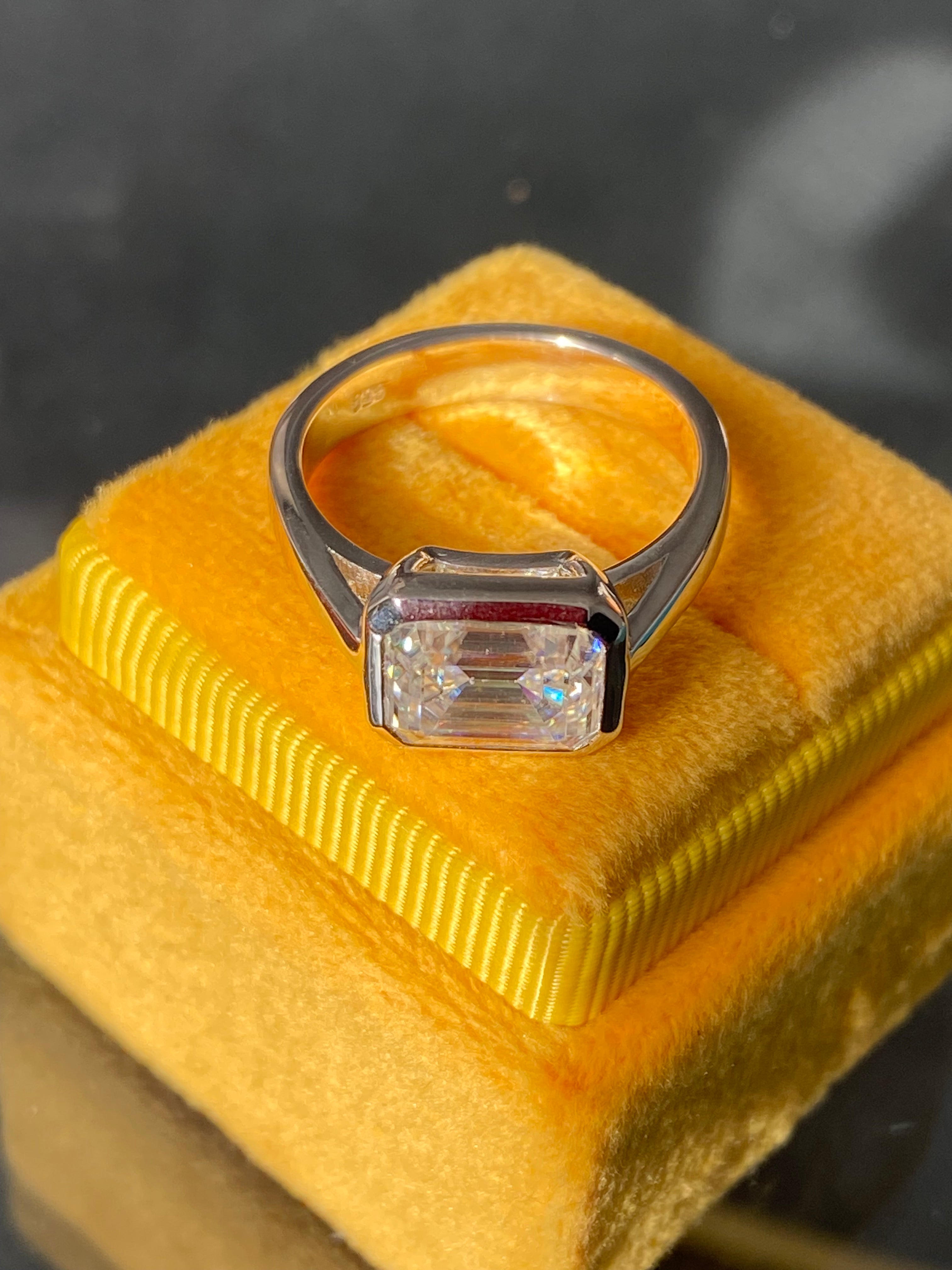 3.00 Carat Emerald Cut Moissanite East West Solitaire Ring in Sterling Silver