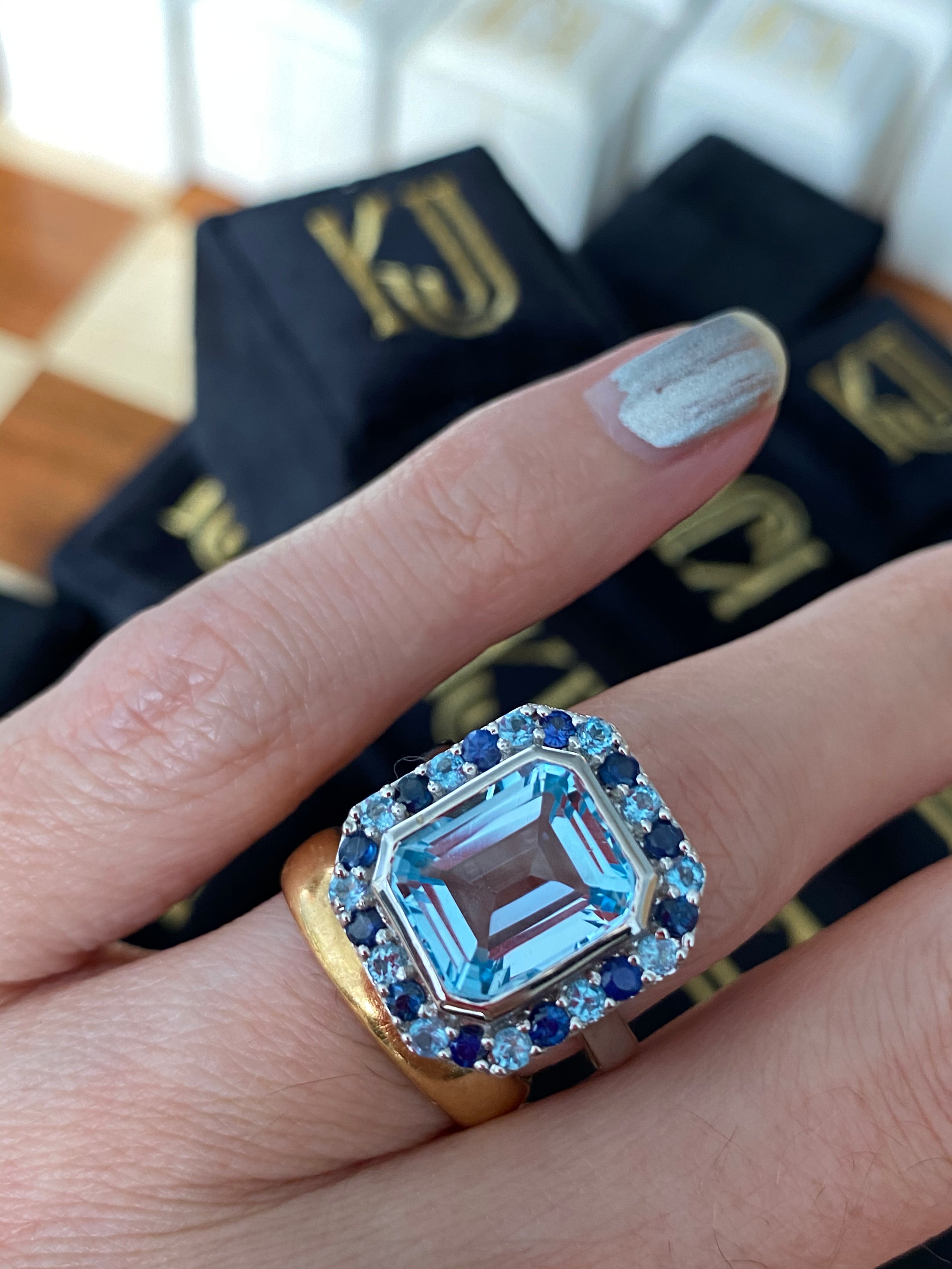 Blue Topaz and Blue Sapphire Halo Cocktail Ring in Sterling Silver