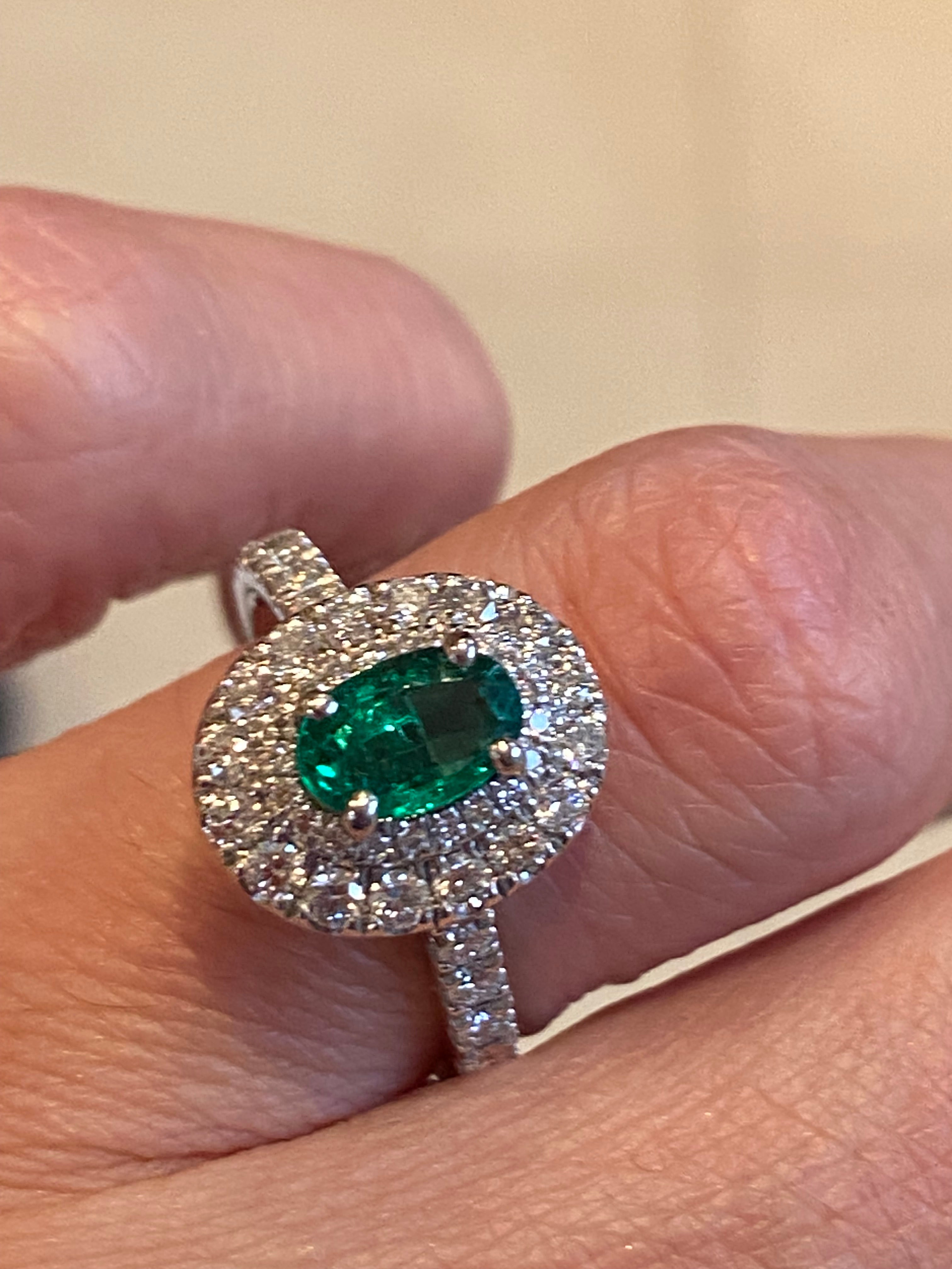 1.45 CTW Emerald and Natural Diamond Double Halo Ring in Platinum