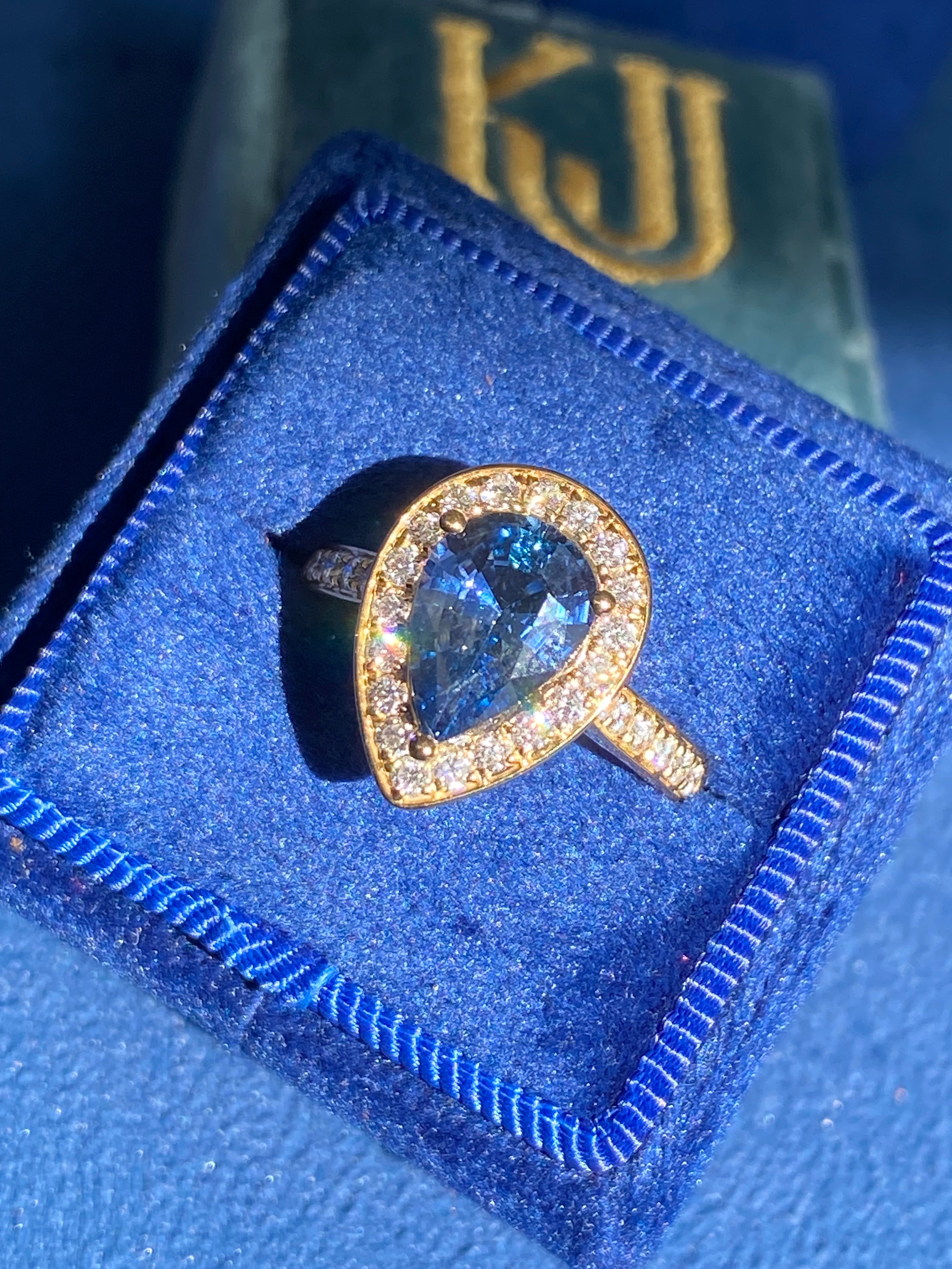 2.07 Carat Pear Cut Teal Sapphire and 0.48 CTW Natural Diamond Ring in 18ct Yellow Gold