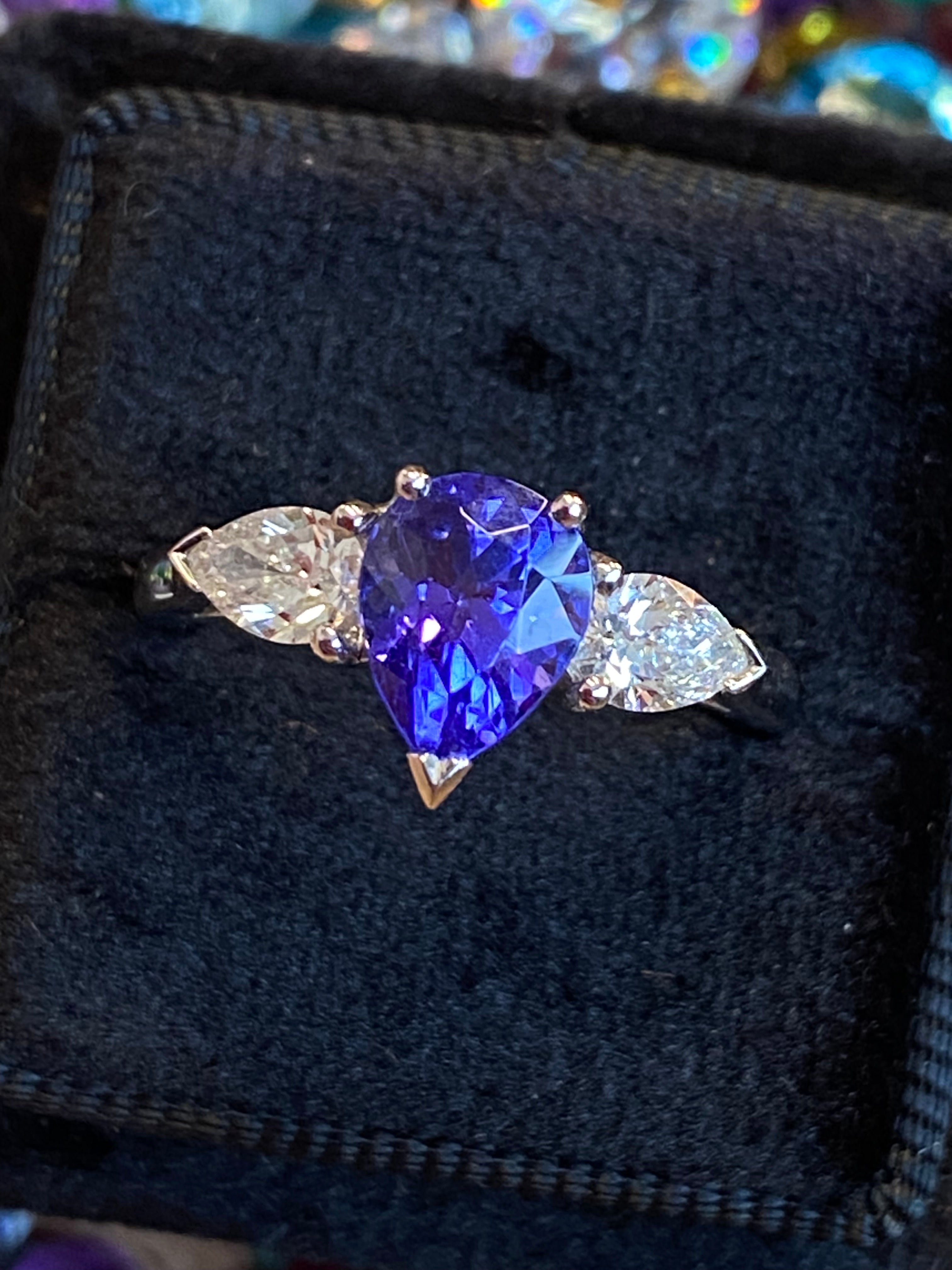 2.47 CTW Pear Cut Tanzanite and Natural Diamond Three Stone Ring in Platinum