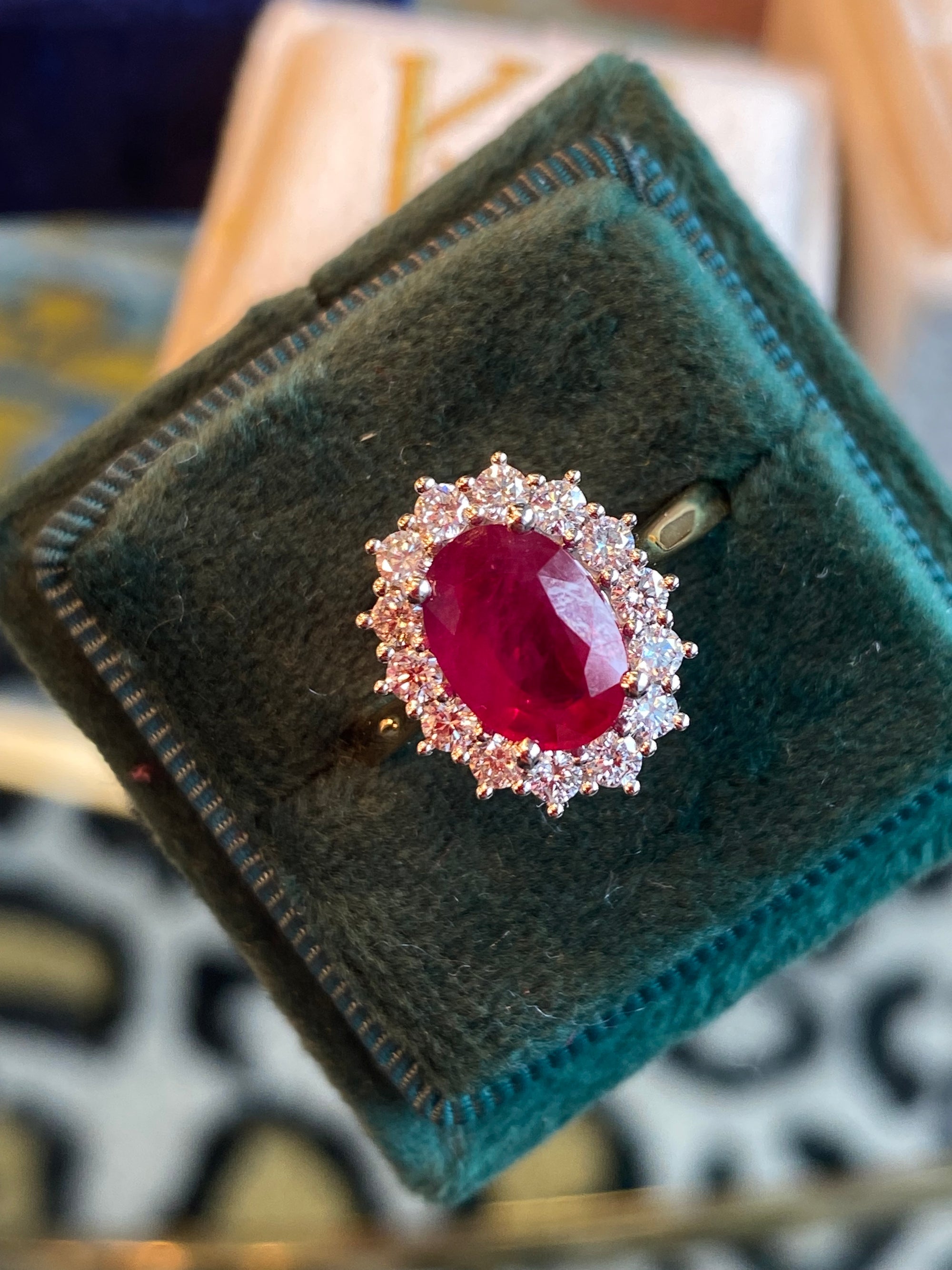 2.95ctw Oval-Cut Ruby and Natural Diamond Halo Ring in Platinum and 18ct Yellow Gold