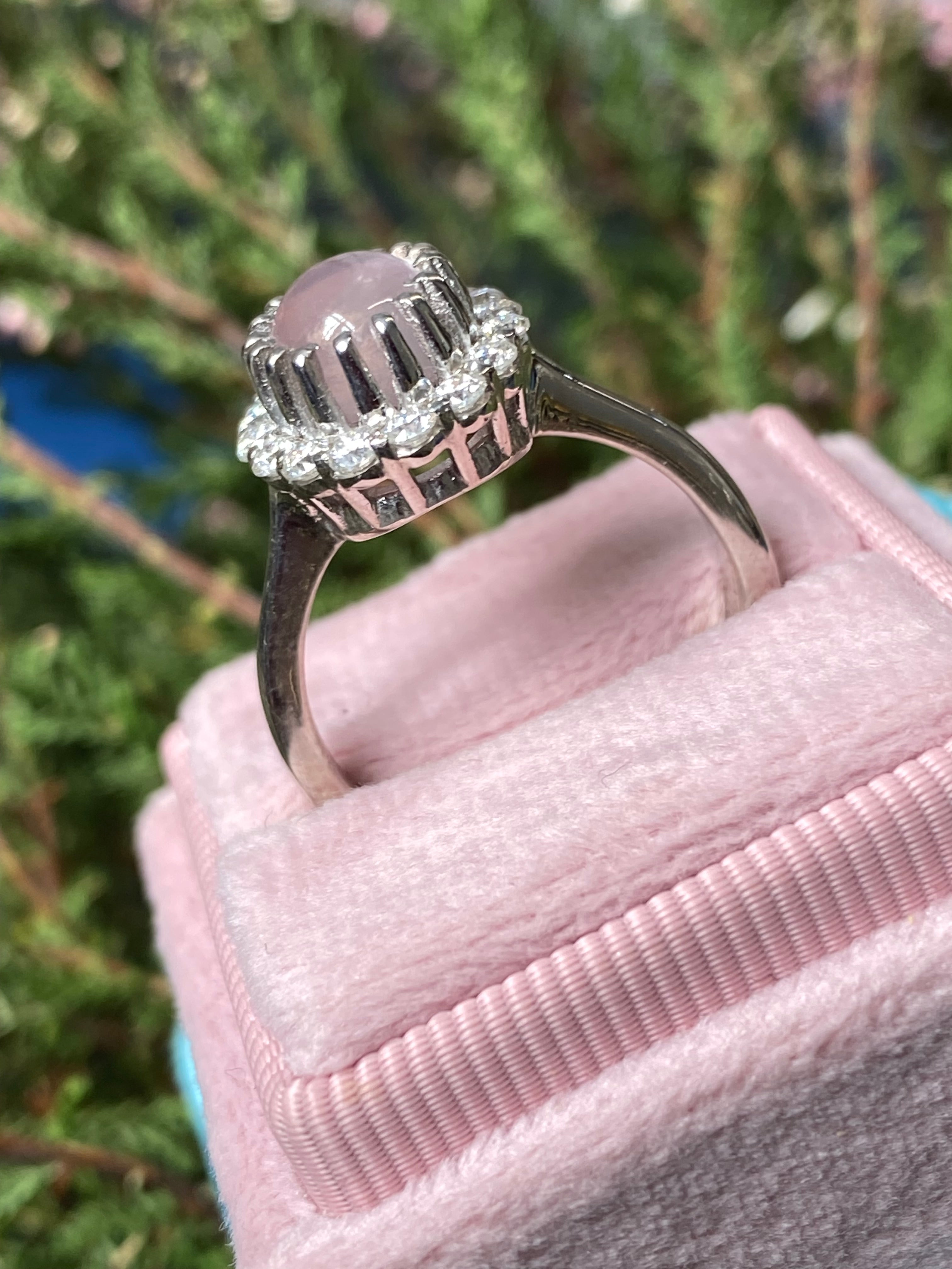 4.50 CTW Oval Cabochon Cut Rose Quartz and Moissanite Halo Cocktail Ring in Sterling Silver