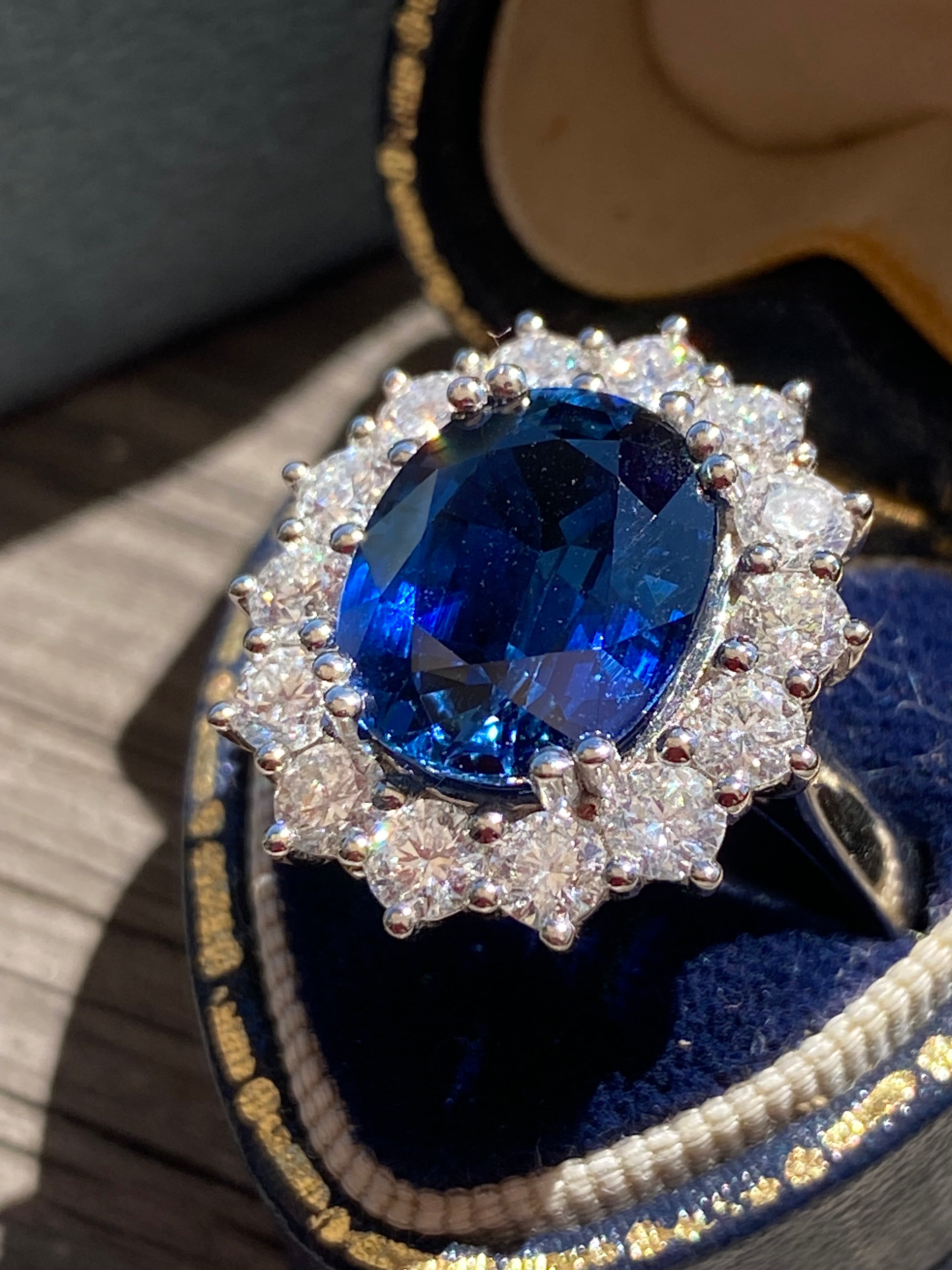 6.37 Carat Gubelin Certed No Heat Blue Ceylon Sapphire and 1.80 CTW Natural Diamond Halo Ring in Platinum