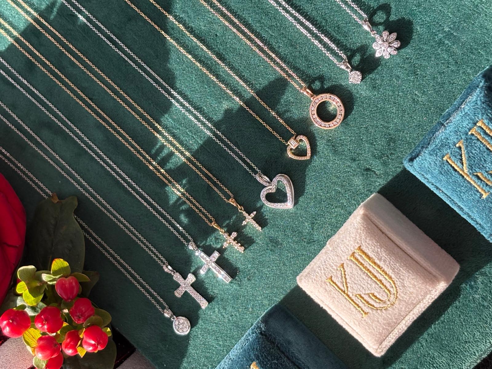 Pear Cut Ruby and Natural Diamond Pendant Necklace in 18ct White Gold