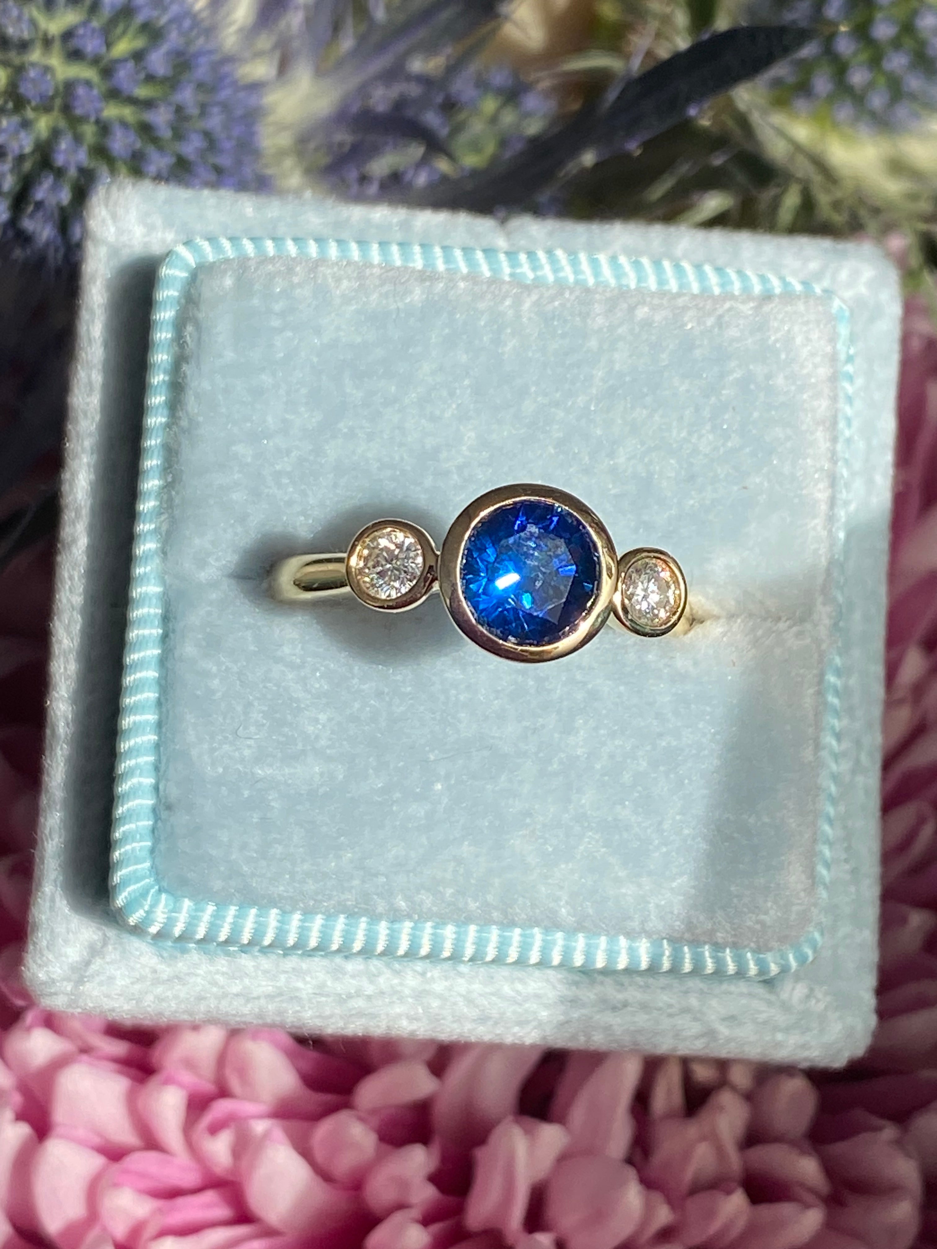 1.41 Carat Blue Ceylon Sapphire and 0.18 CTW Natural Diamond Halo Ring in 18ct Yellow Gold