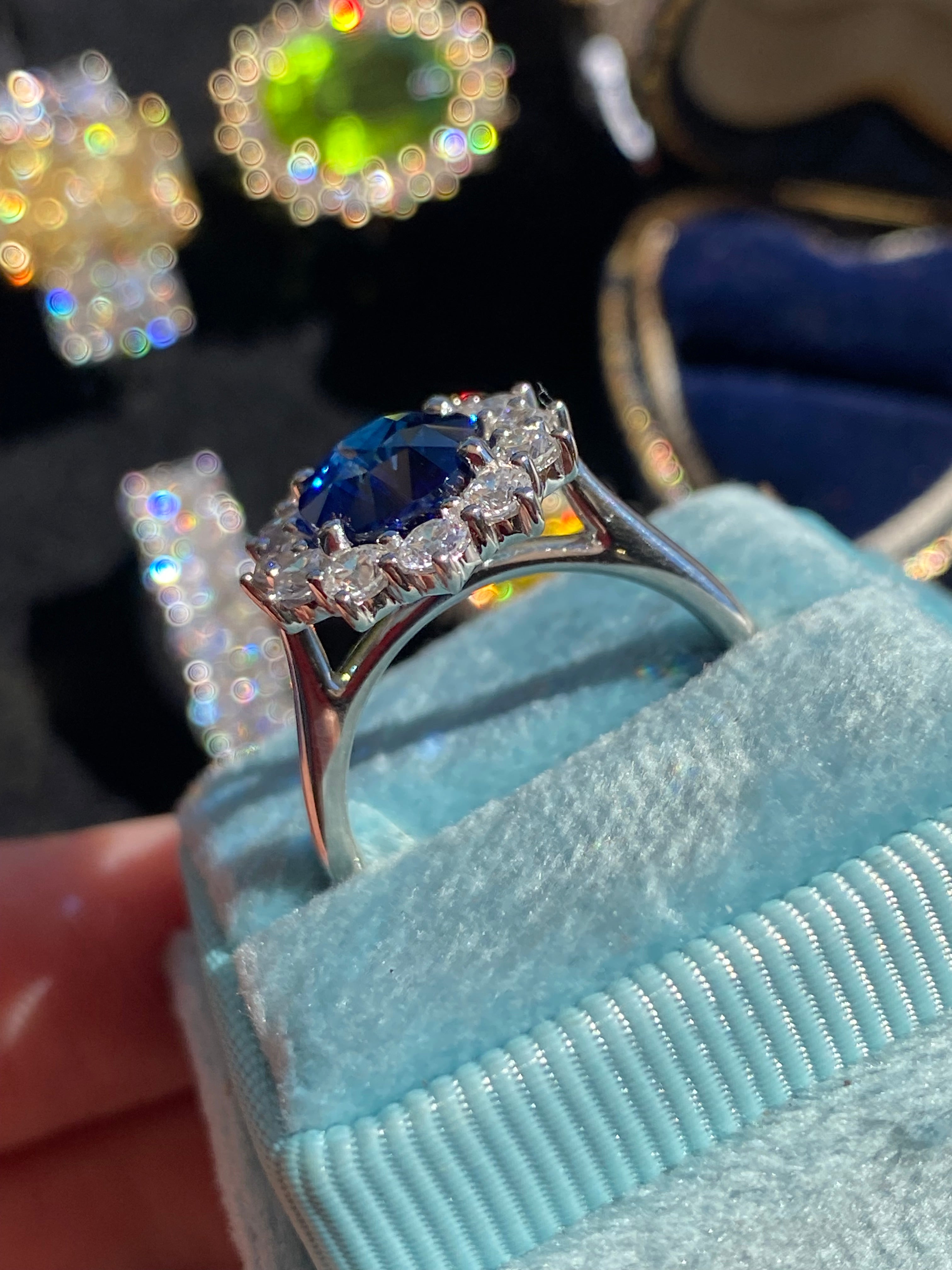 6.37 Carat Gubelin Certed Blue Ceylon Sapphire and 1.80 CTW Natural Diamond Halo Ring in Platinum