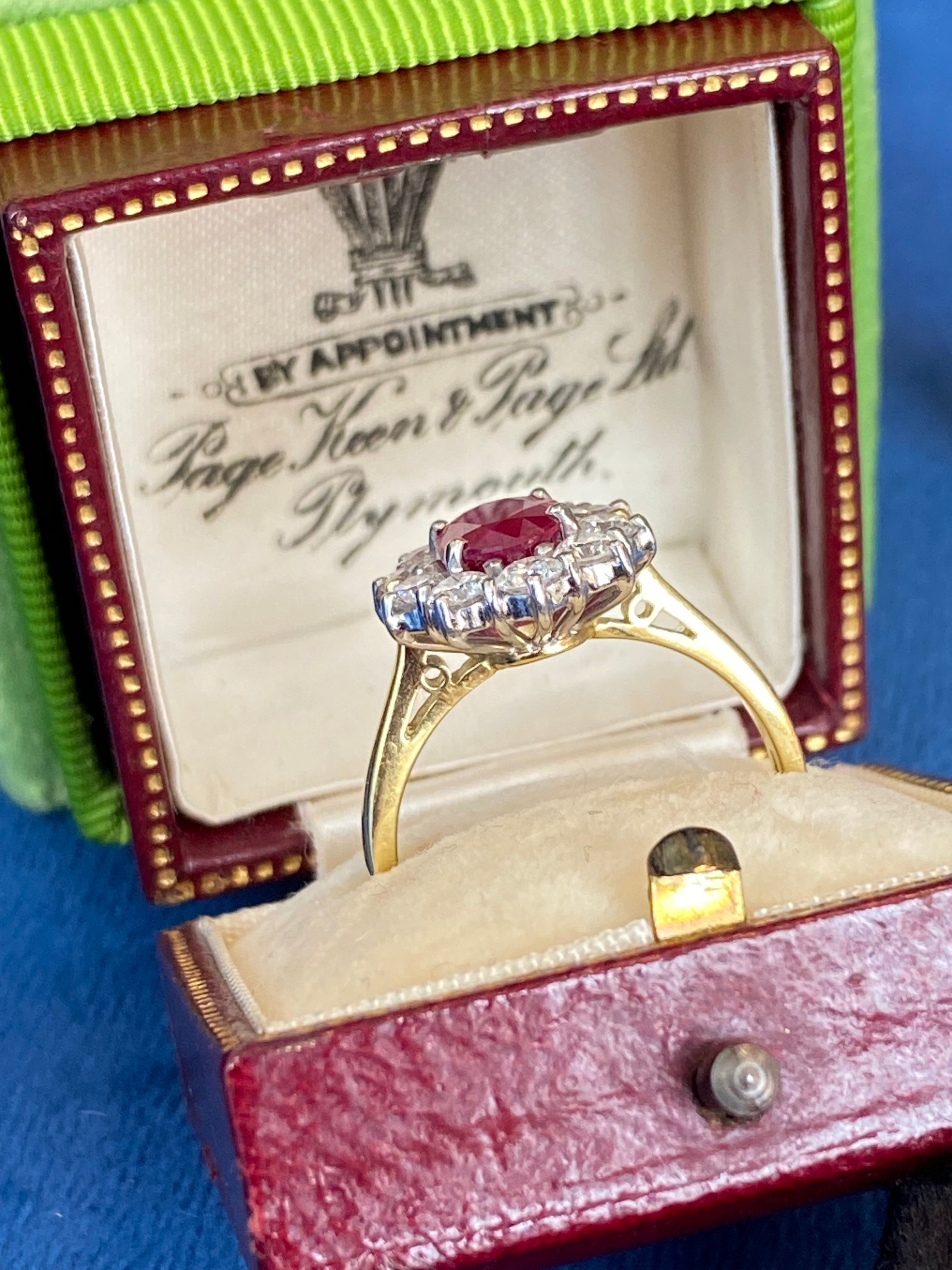 Breathtaking Ruby and Natural Diamond Halo Ring in 18ct Gold