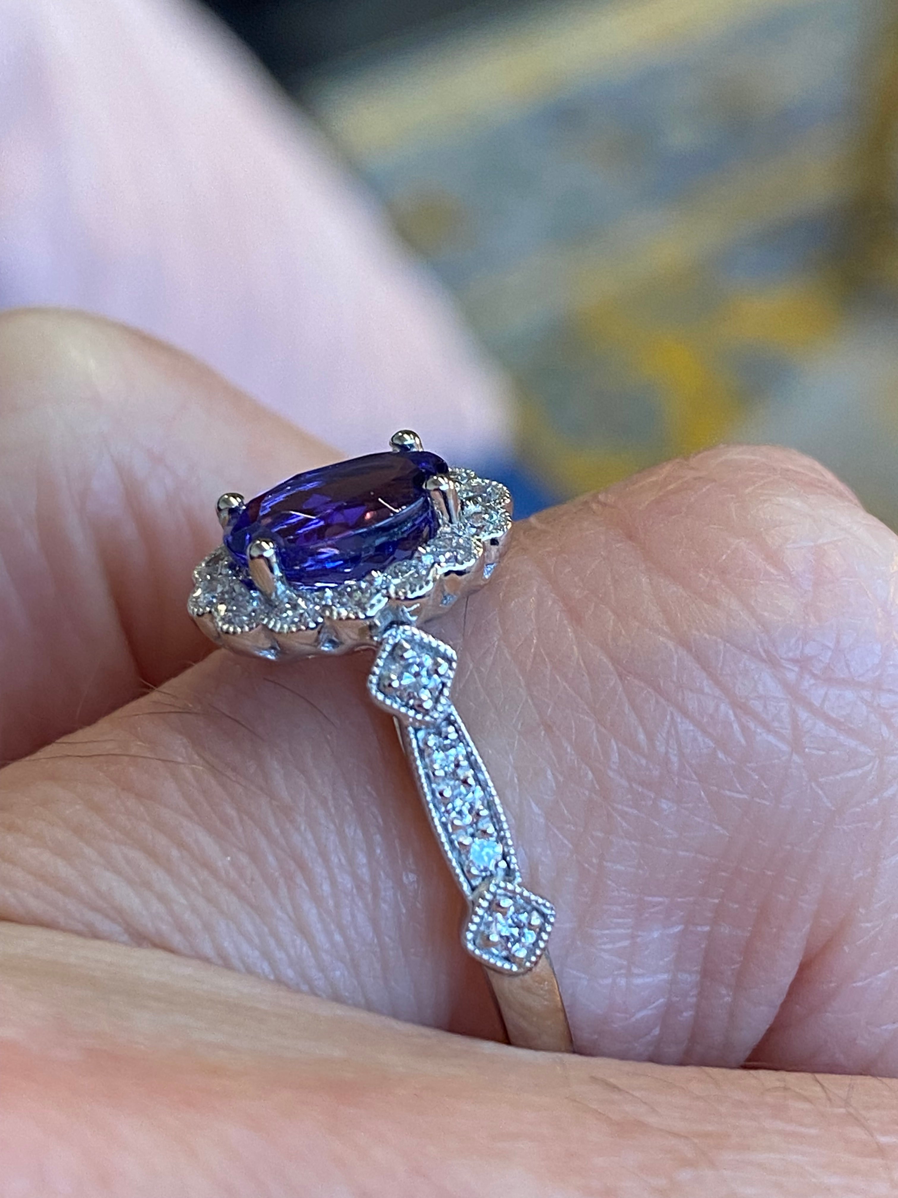 1.44 CTW Tanzanite and Natural Diamond Halo Ring in Platinum