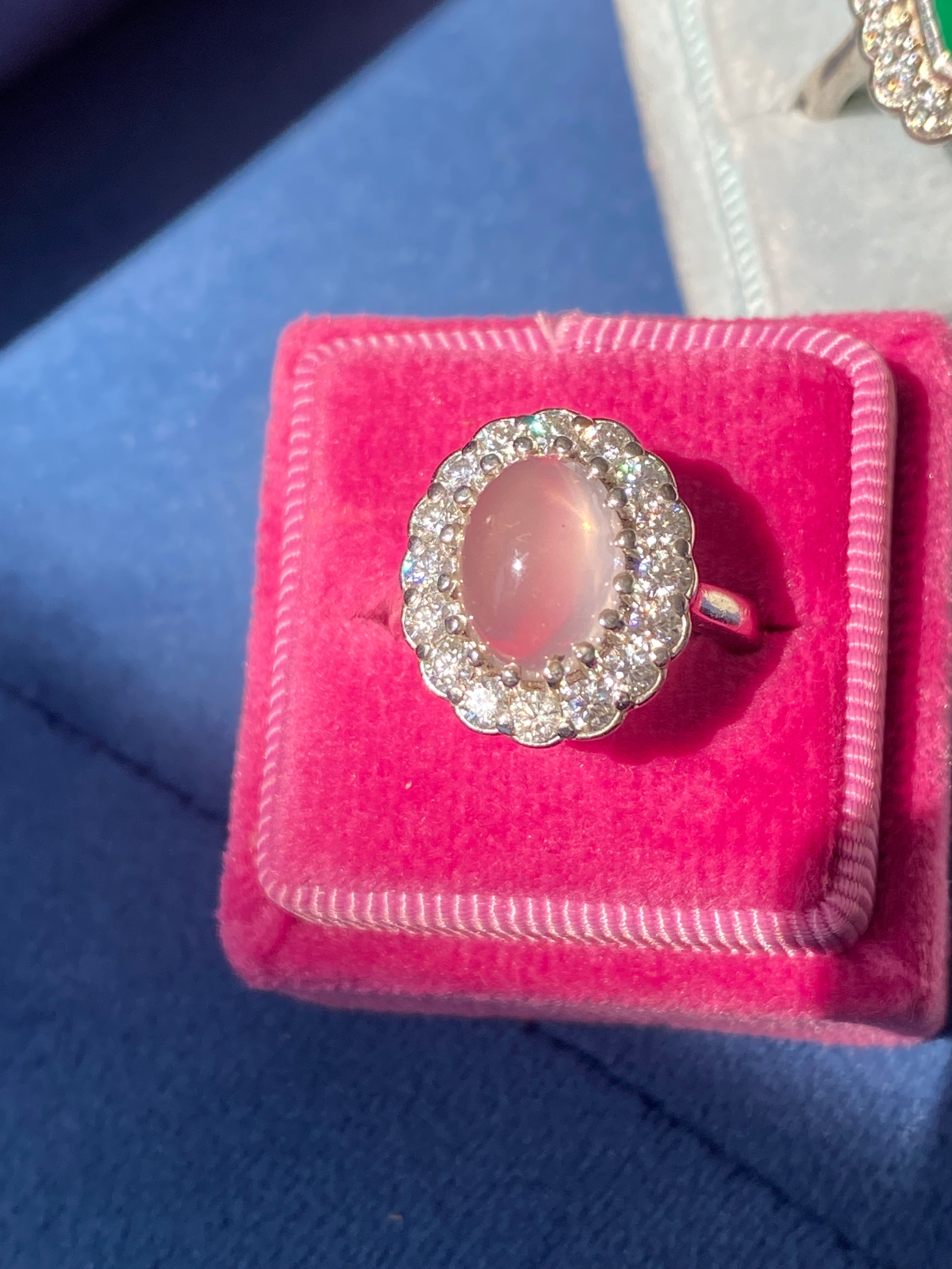 4.50 CTW Oval Cabochon Cut Rose Quartz and Moissanite Halo Cocktail Ring in Sterling Silver