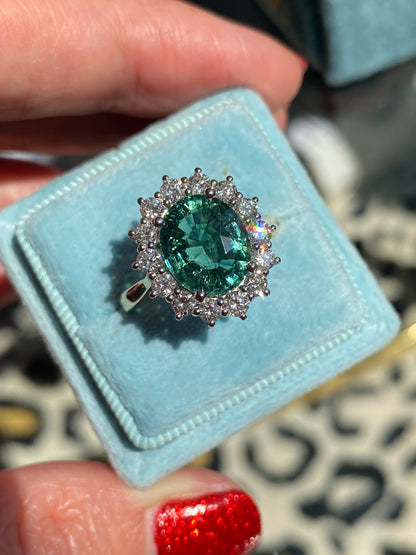 3.06 Carat Blue Tourmaline and Natural Diamond Halo Ring in Platinum and 18ct Yellow Gold