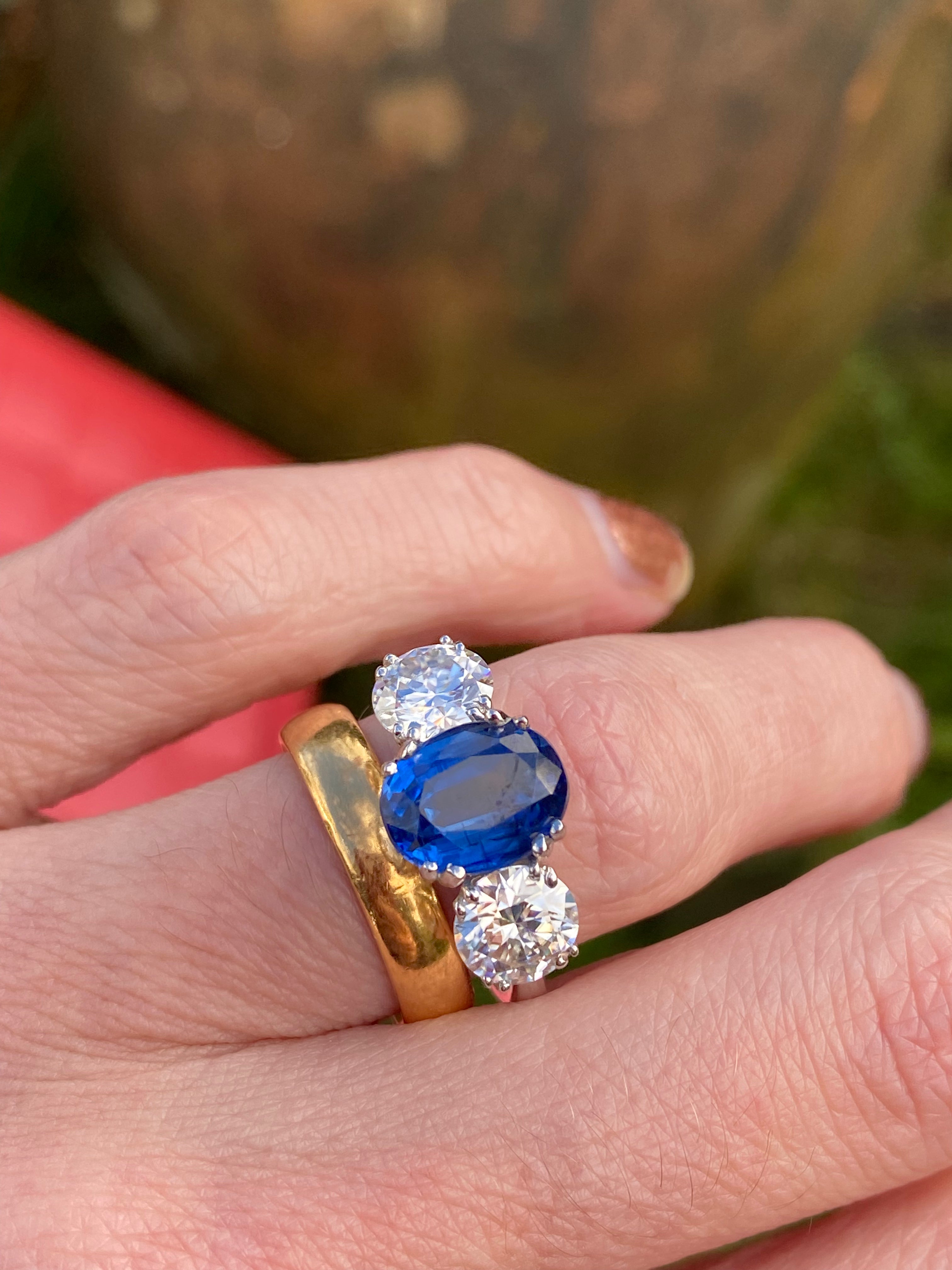 4.41 CTW Oval Cut Kyanite and Moissanite Three Stone Ring in Sterling Silver