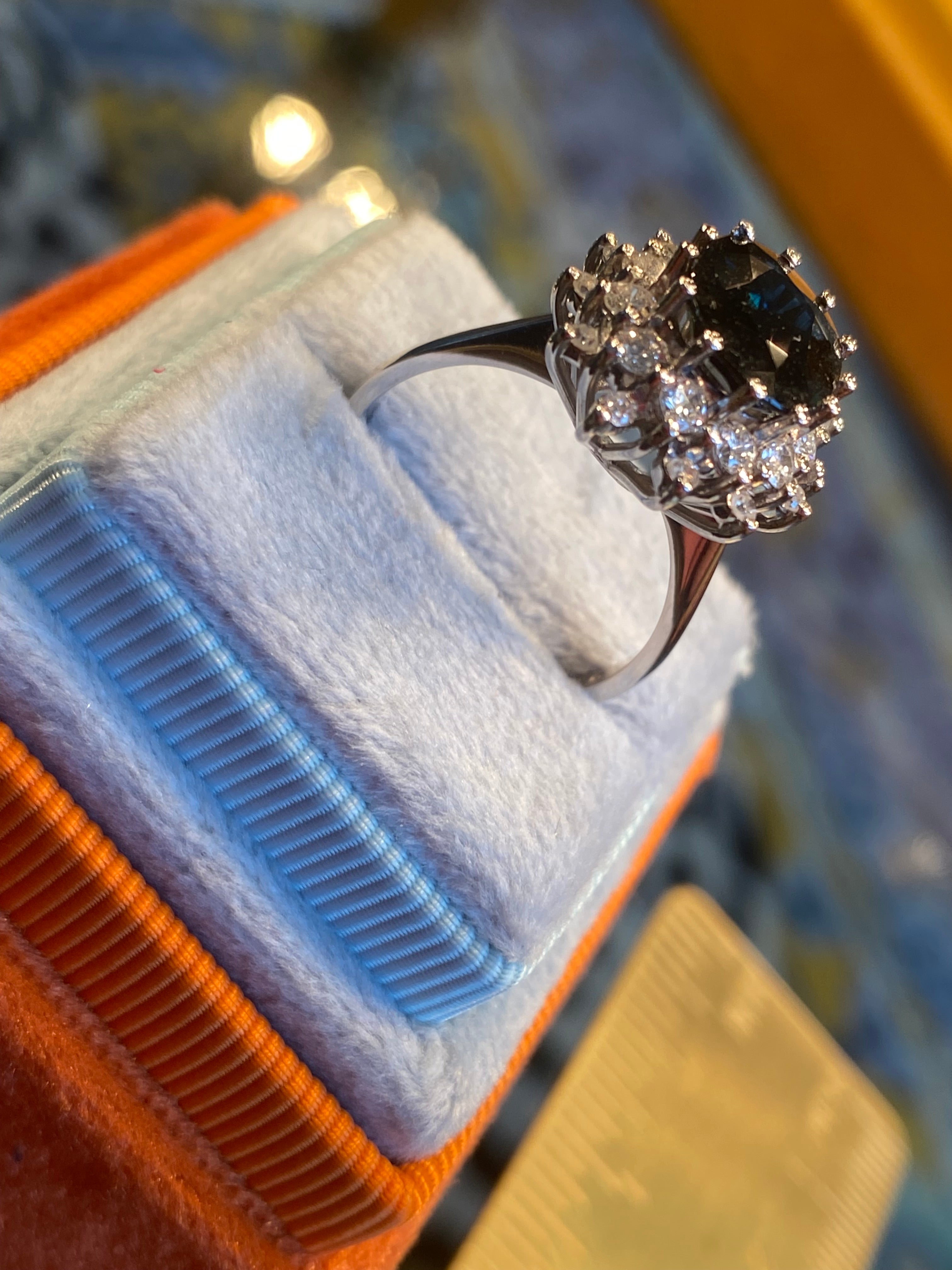 2.75 Carat Oval Blue Sapphire and 1.00 Carat Diamond Halo Ring in 18ct White Gold