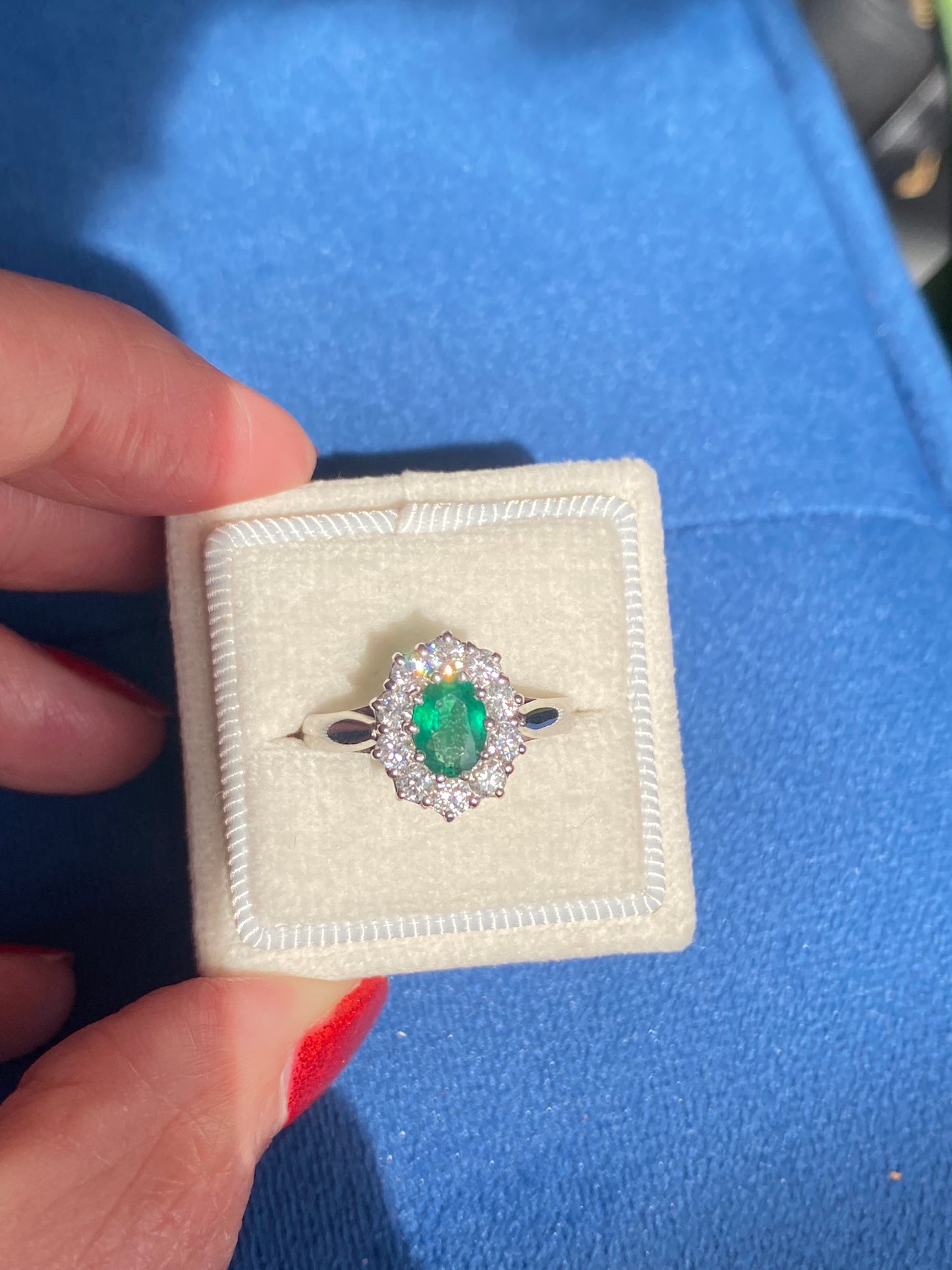 0.60 Carat Emerald and 0.66 ctw Natural Diamond Halo Engagement Ring in Platinum