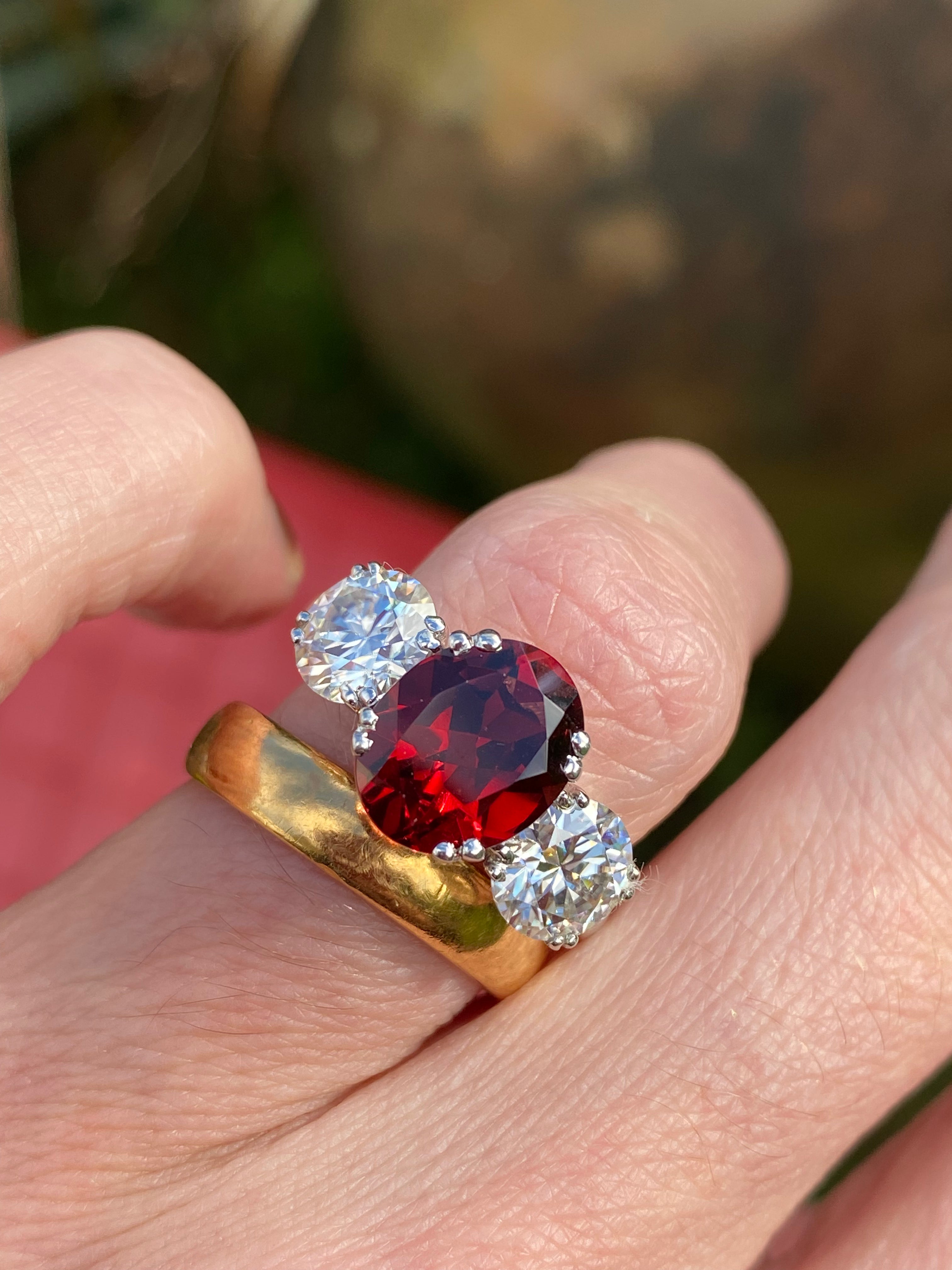 2.57 Carat Garnet and 1.84 Carat Moissanite Three Stone Ring in Sterling Silver