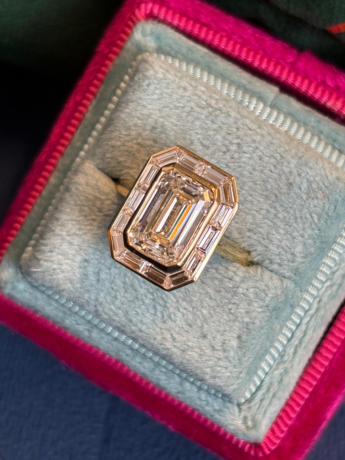 3.74 CTW Emerald Cut Lab Diamond Halo Engagement Ring in 18ct Yellow Gold