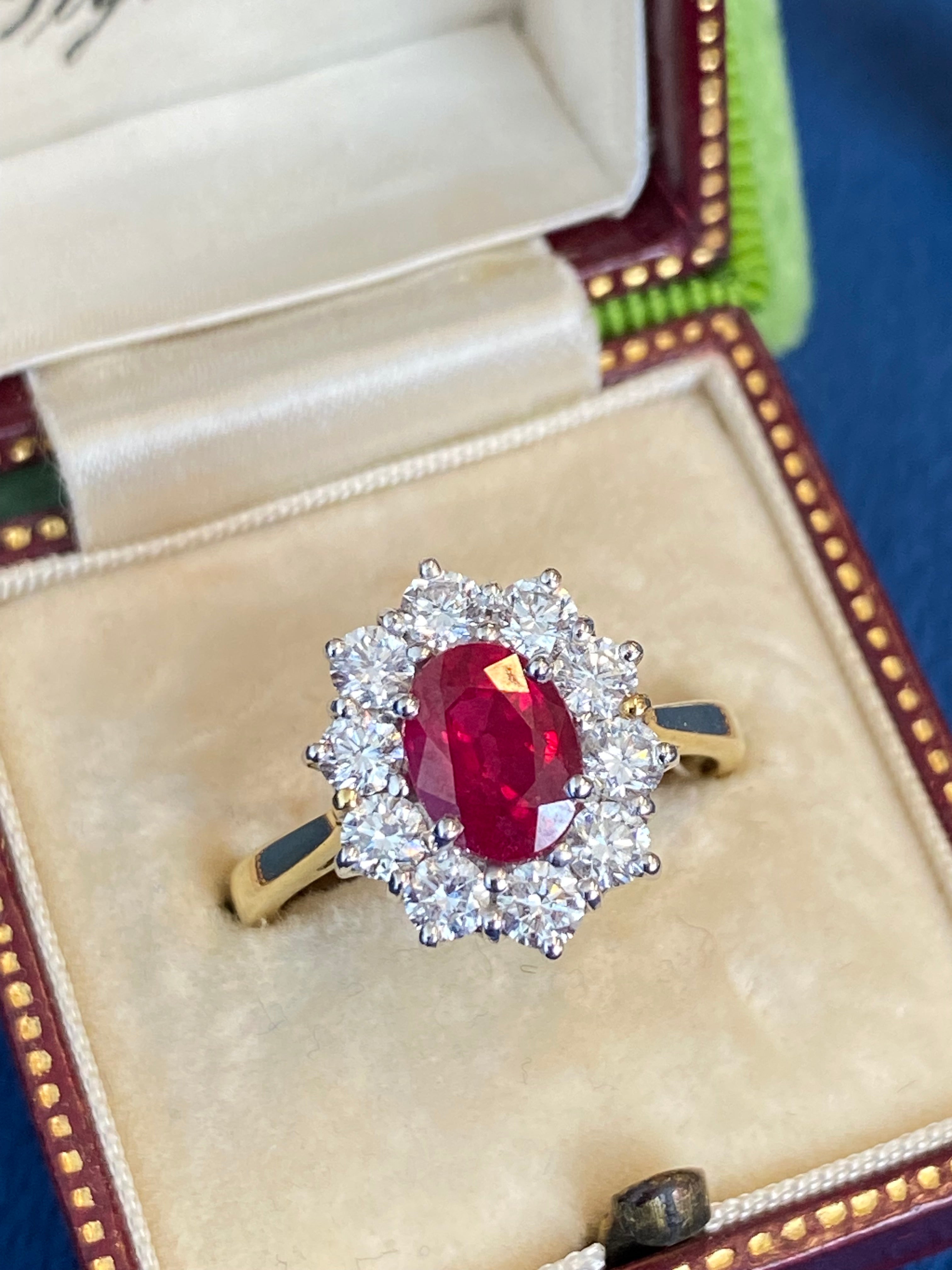 Breathtaking Ruby and Natural Diamond Halo Ring in 18ct Gold