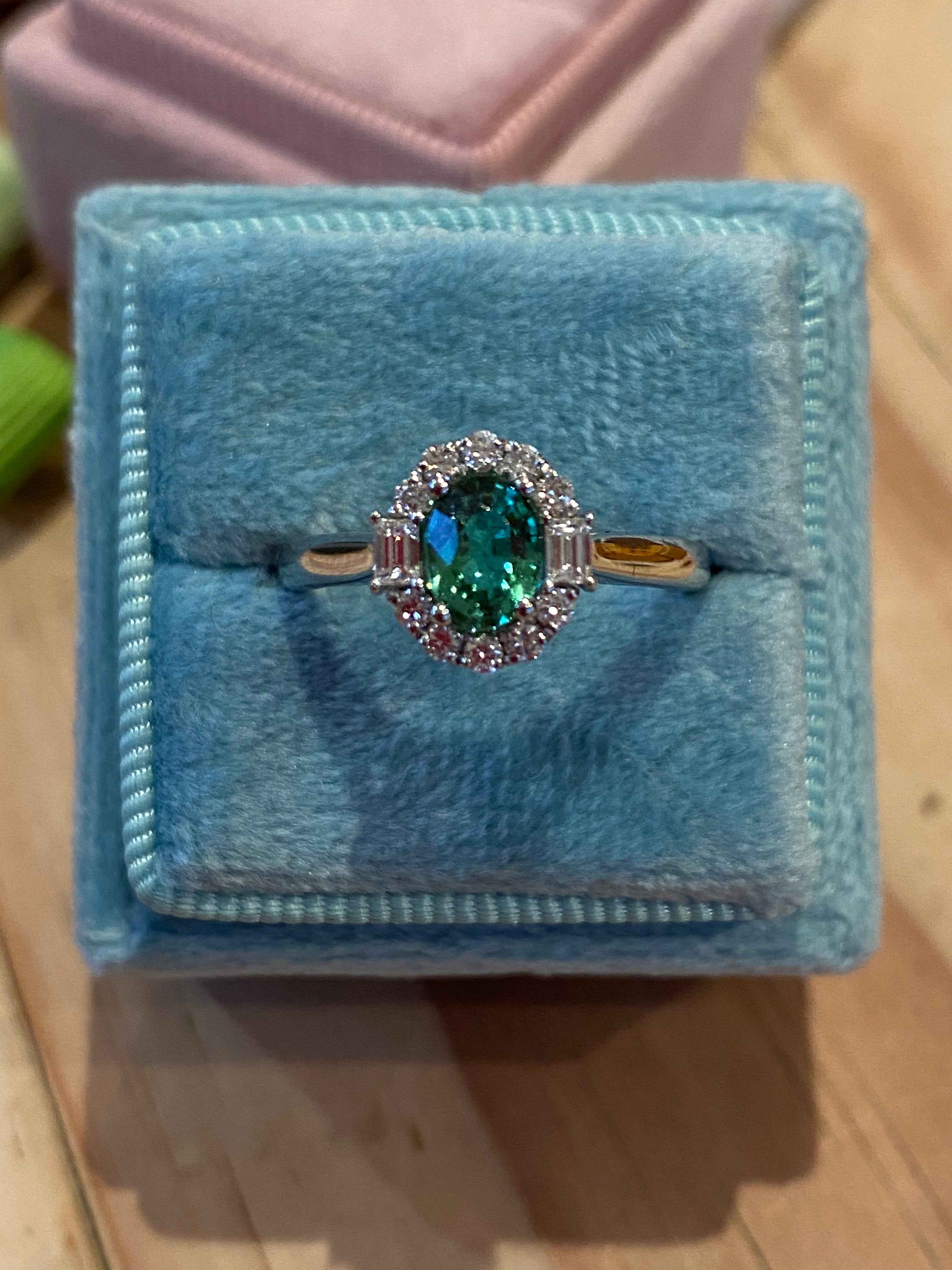 0.94 CTW Oval Cut Green Tourmaline and Natural Diamond Halo Ring in Platinum