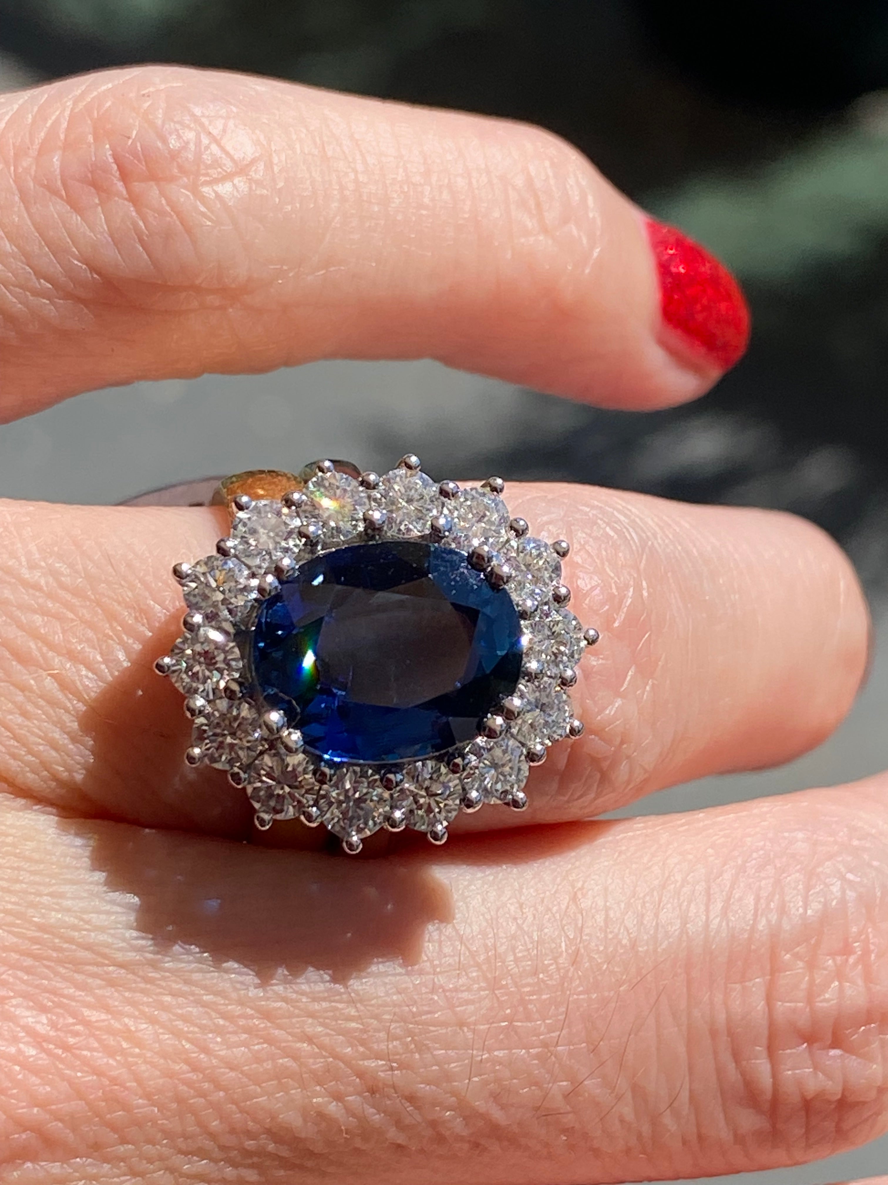 6.37 Carat Gubelin Certed No Heat Blue Ceylon Sapphire and 1.80 CTW Natural Diamond Halo Ring in Platinum