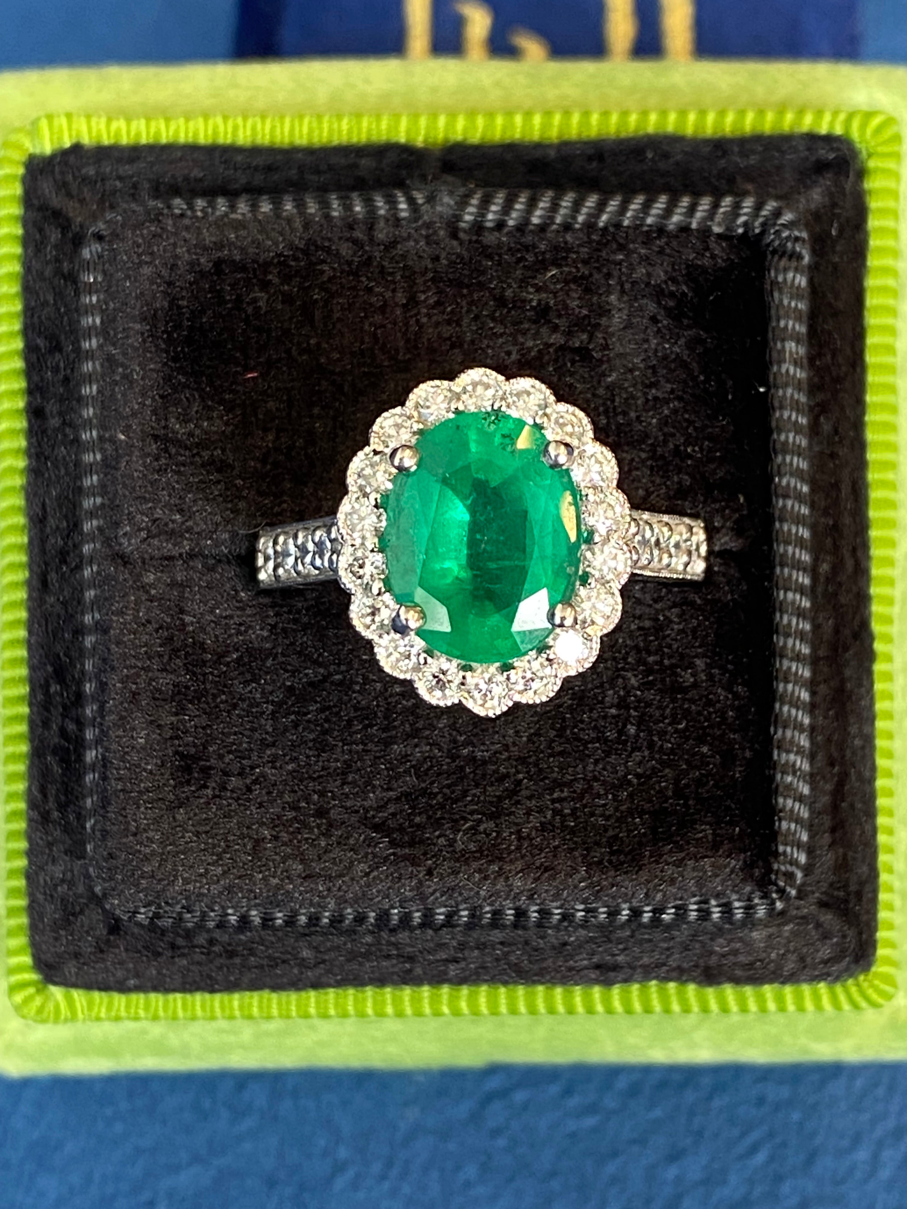 3.12 CTW Oval Cut Emerald and Natural Diamond Halo Ring in Platinum