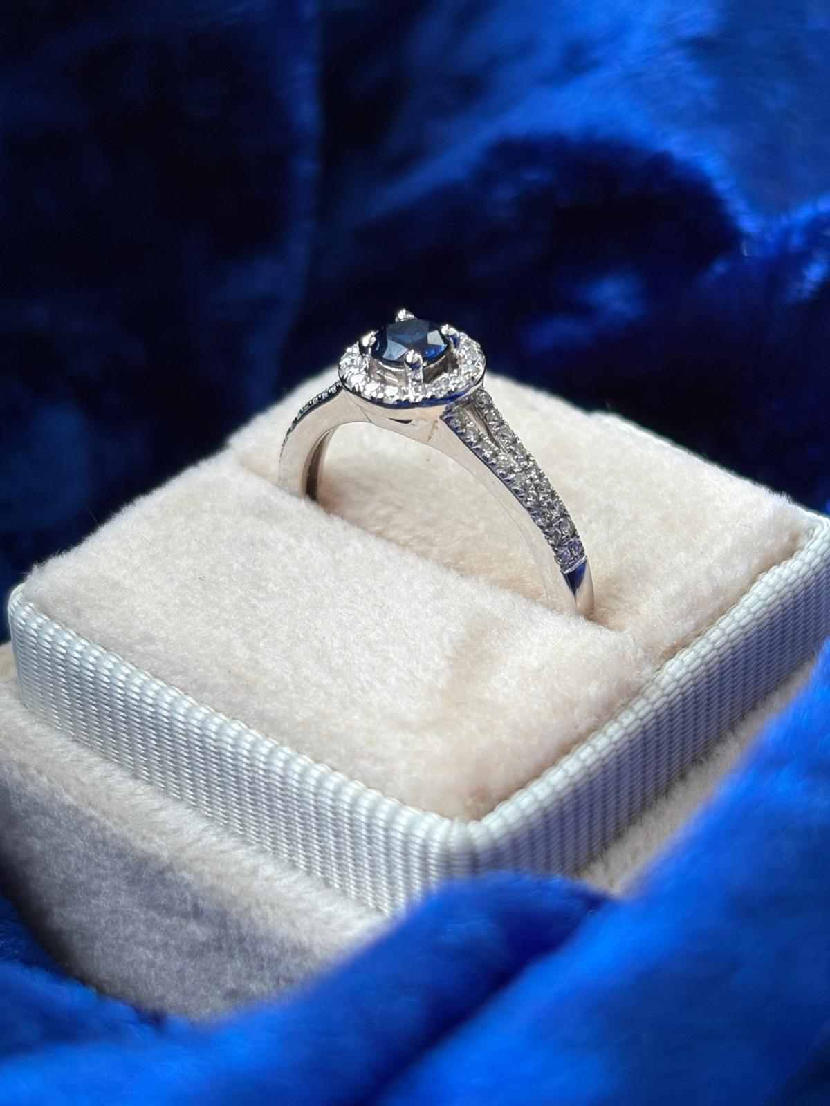 Beautiful Sapphire and Natural Diamond Halo Ring in 18ct White Gold