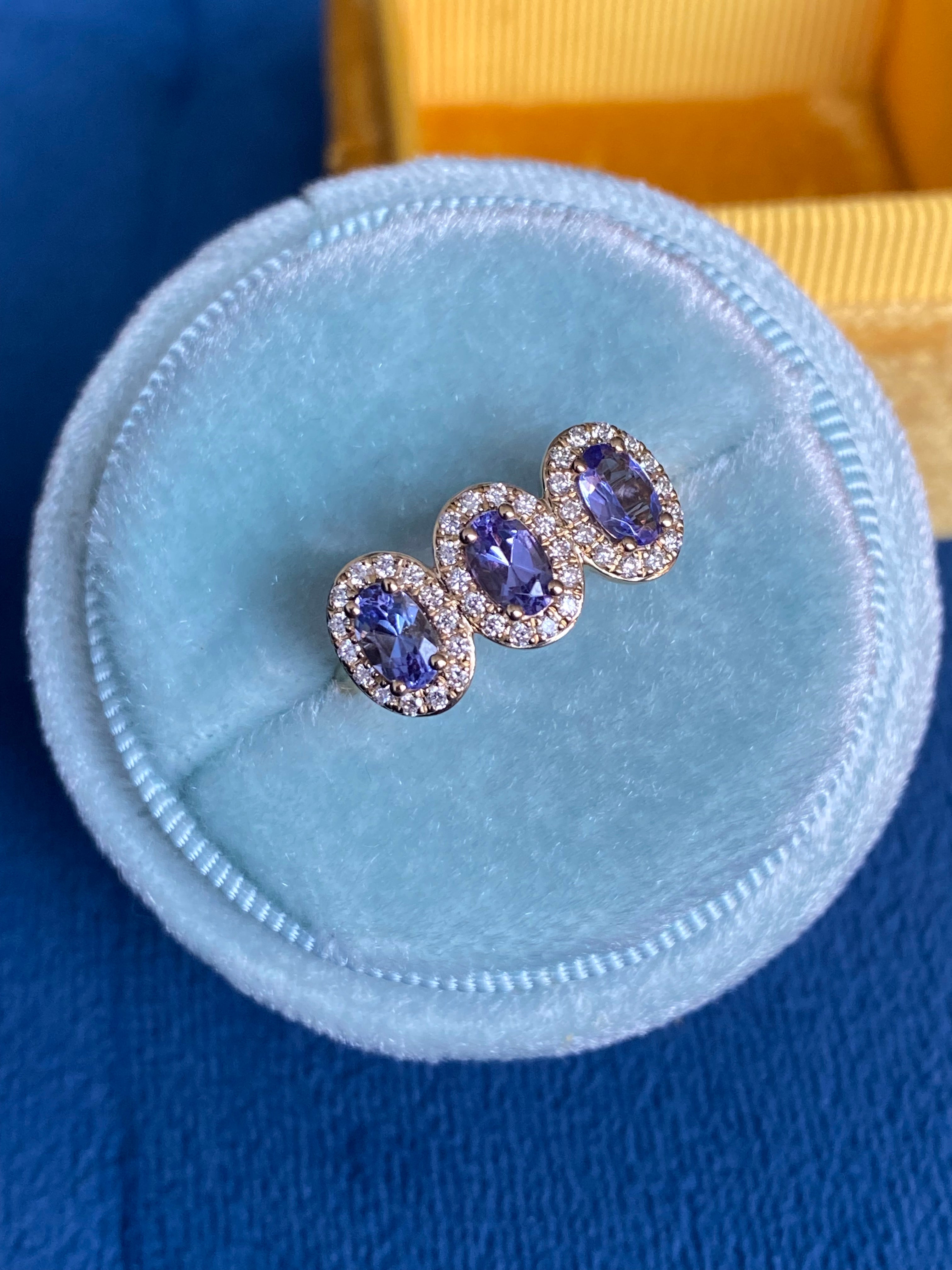 Stunning 1.11 CTW Tanzanite and Natural Diamond Ring in 9ct Yellow Gold