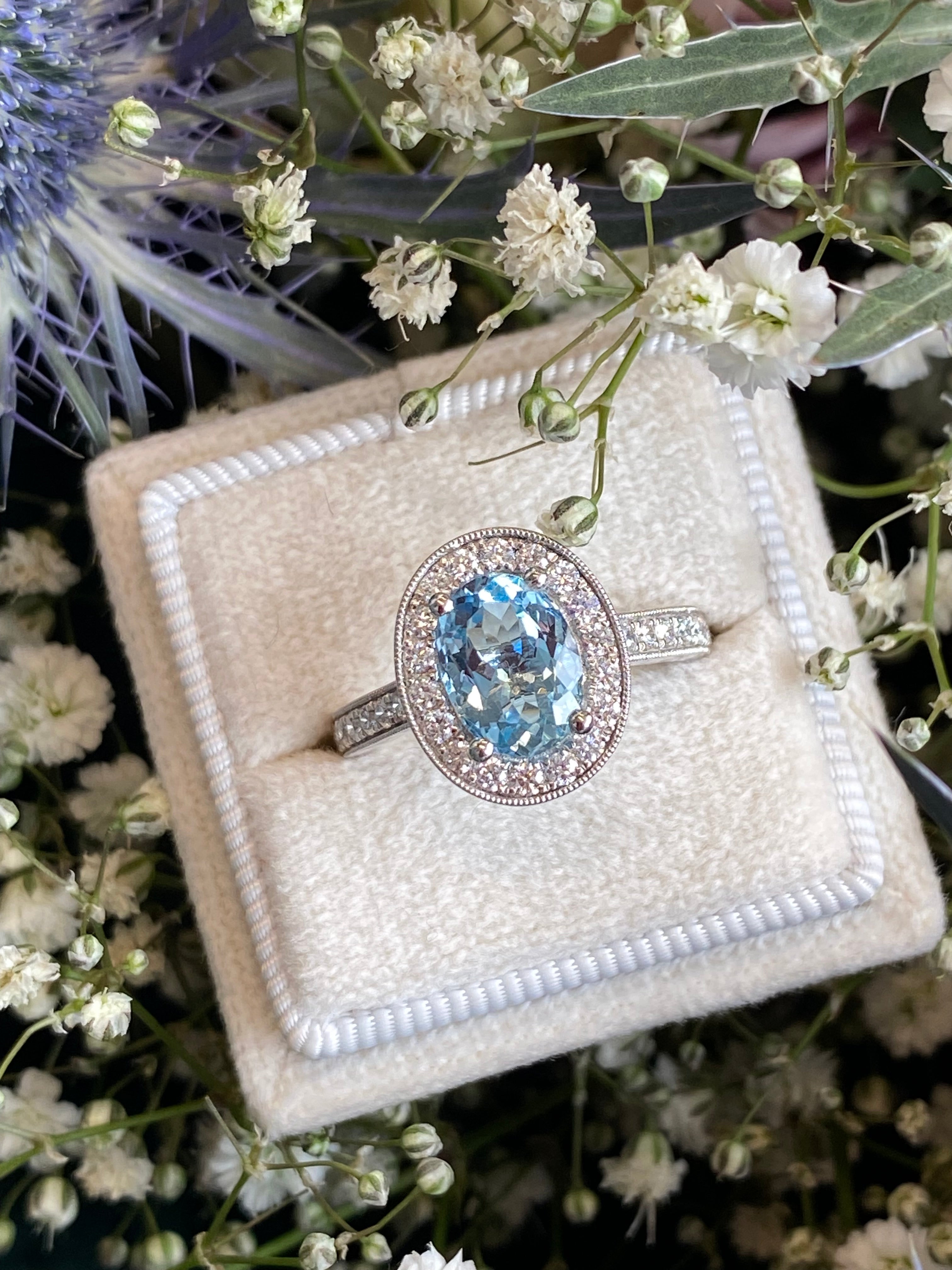 2.33 CTW Oval Cut Aquamarine and Natural Diamond Halo Engagement Ring in 18ct White Gold