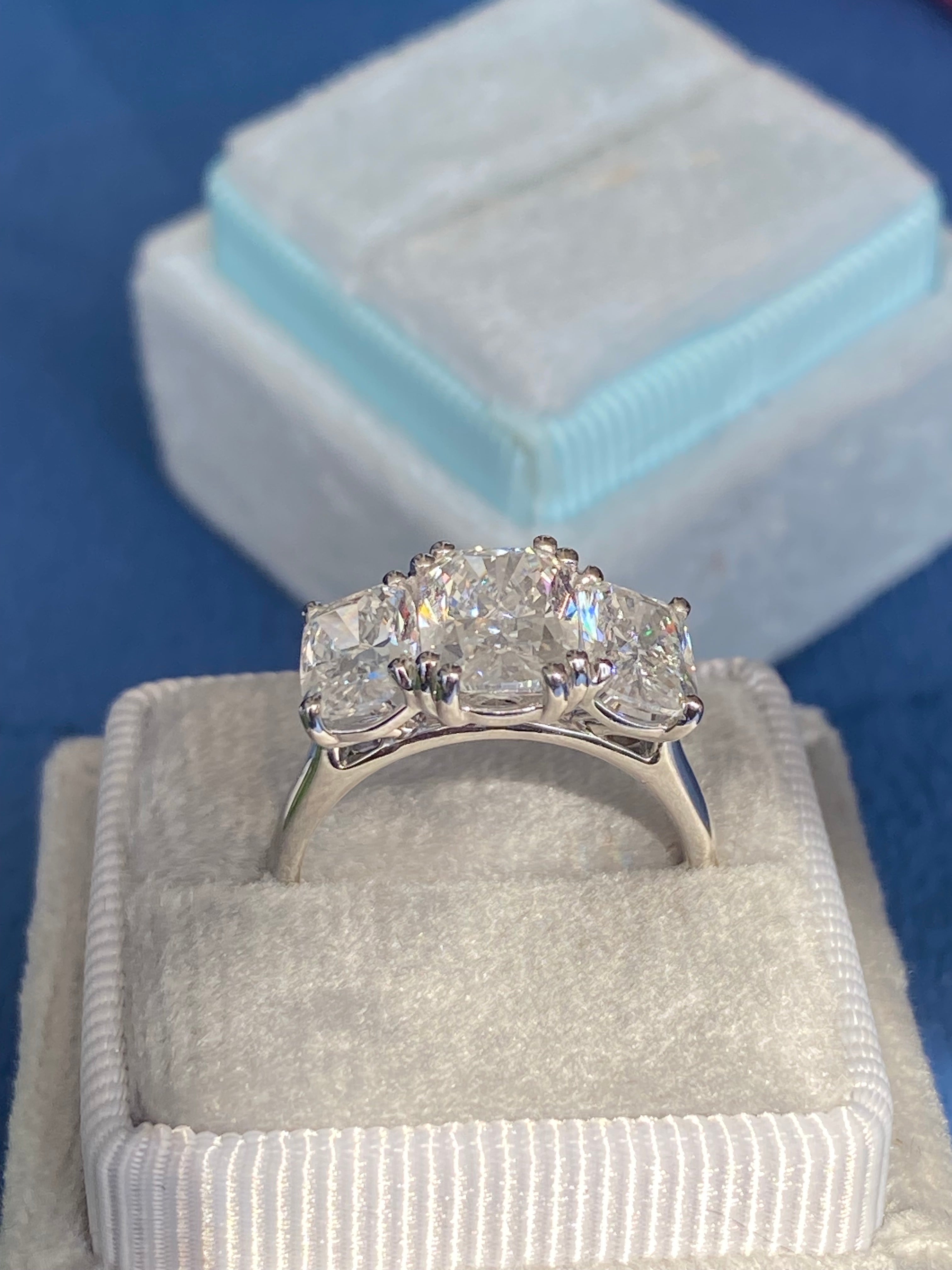 4.10 CTW Cushion Cut D Colour VS1 Lab Diamond Three Stone Ring in Platinum