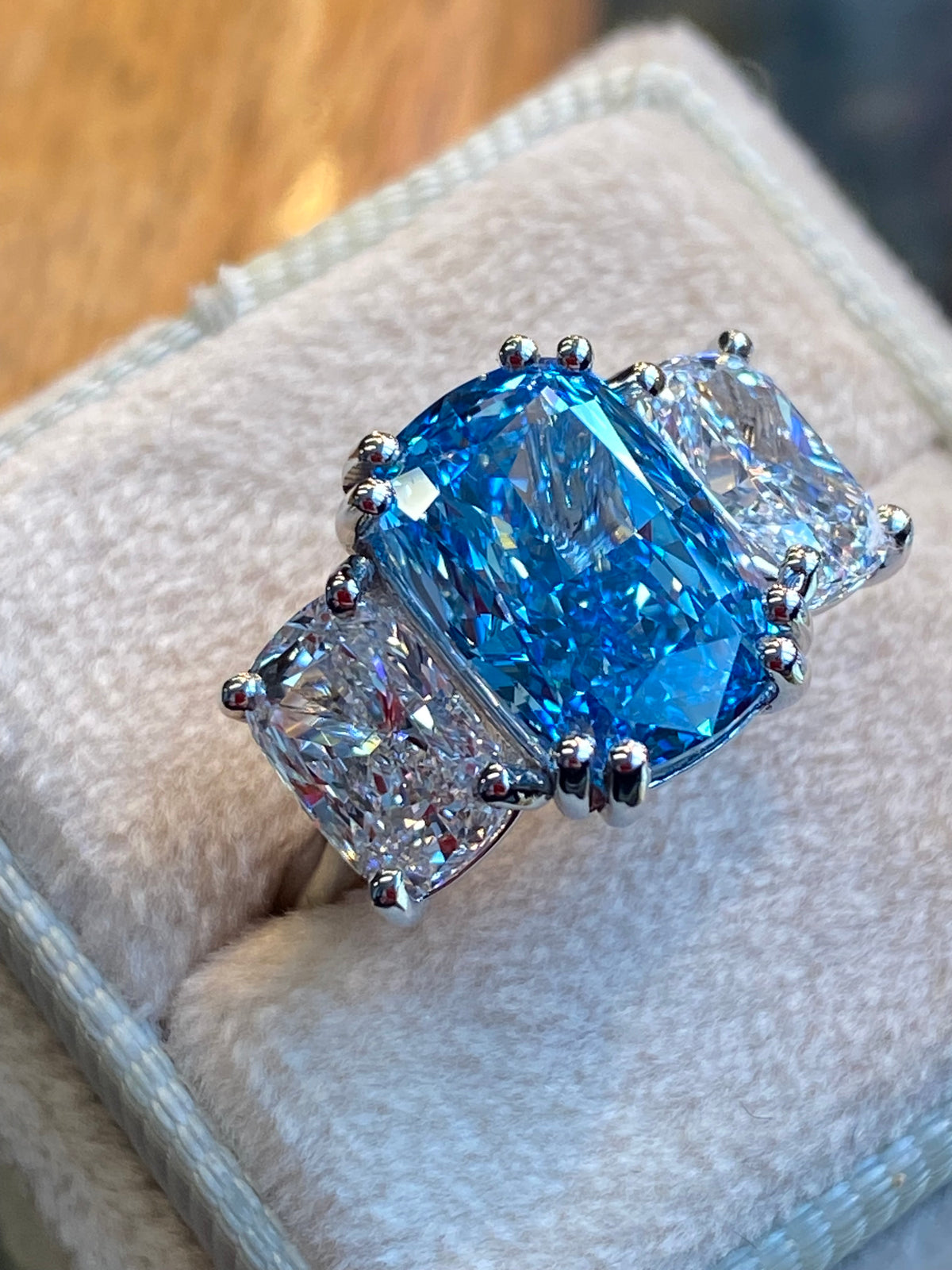 6.60 CTW Fancy Blue Cushion Cut Lab Diamond Graduated Three Stone Ring in Platinum