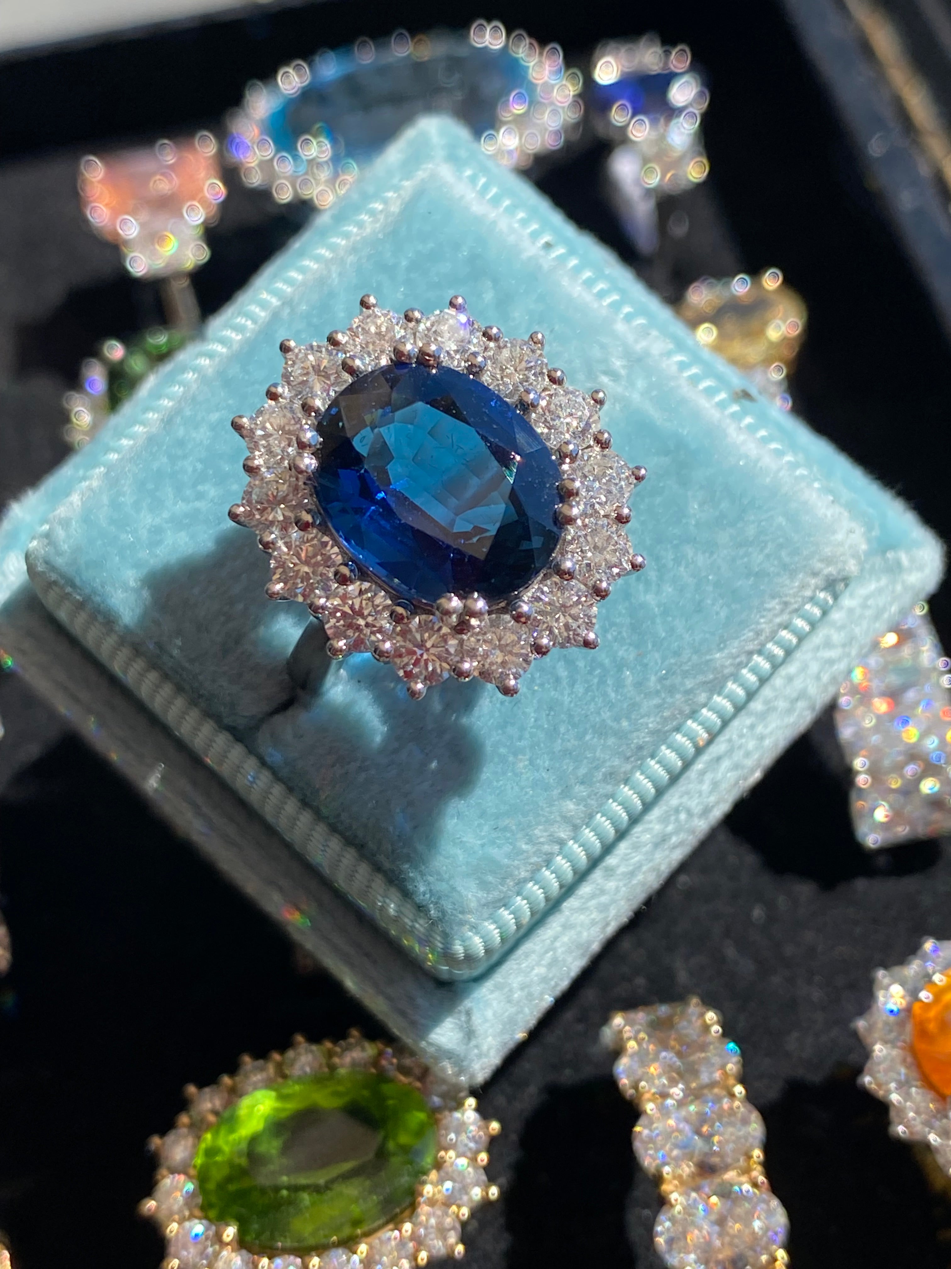 6.37 Carat Gubelin Certed No Heat Blue Ceylon Sapphire and 1.80 CTW Natural Diamond Halo Ring in Platinum