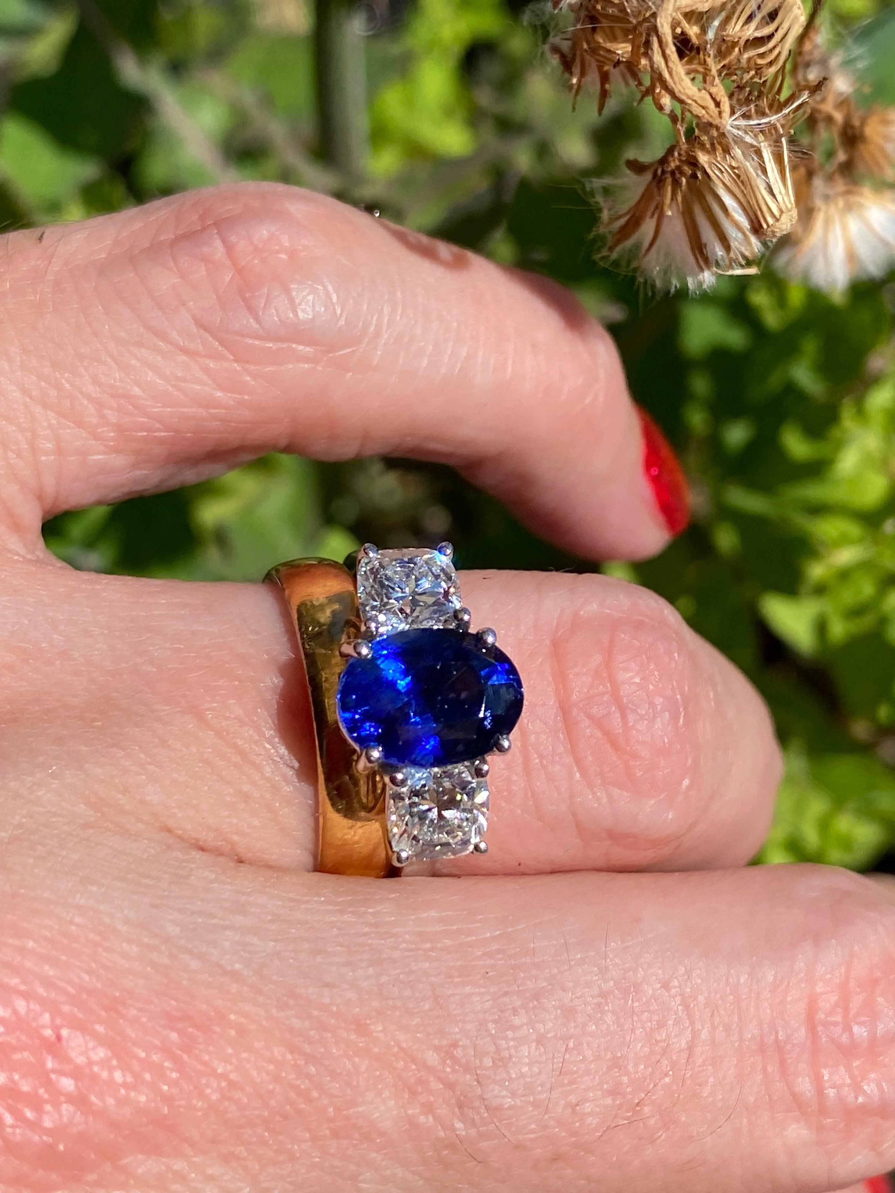 4.33 CTW Blue Ceylon Sapphire and Natural Diamond Three Stone Engagement Ring in Platinum