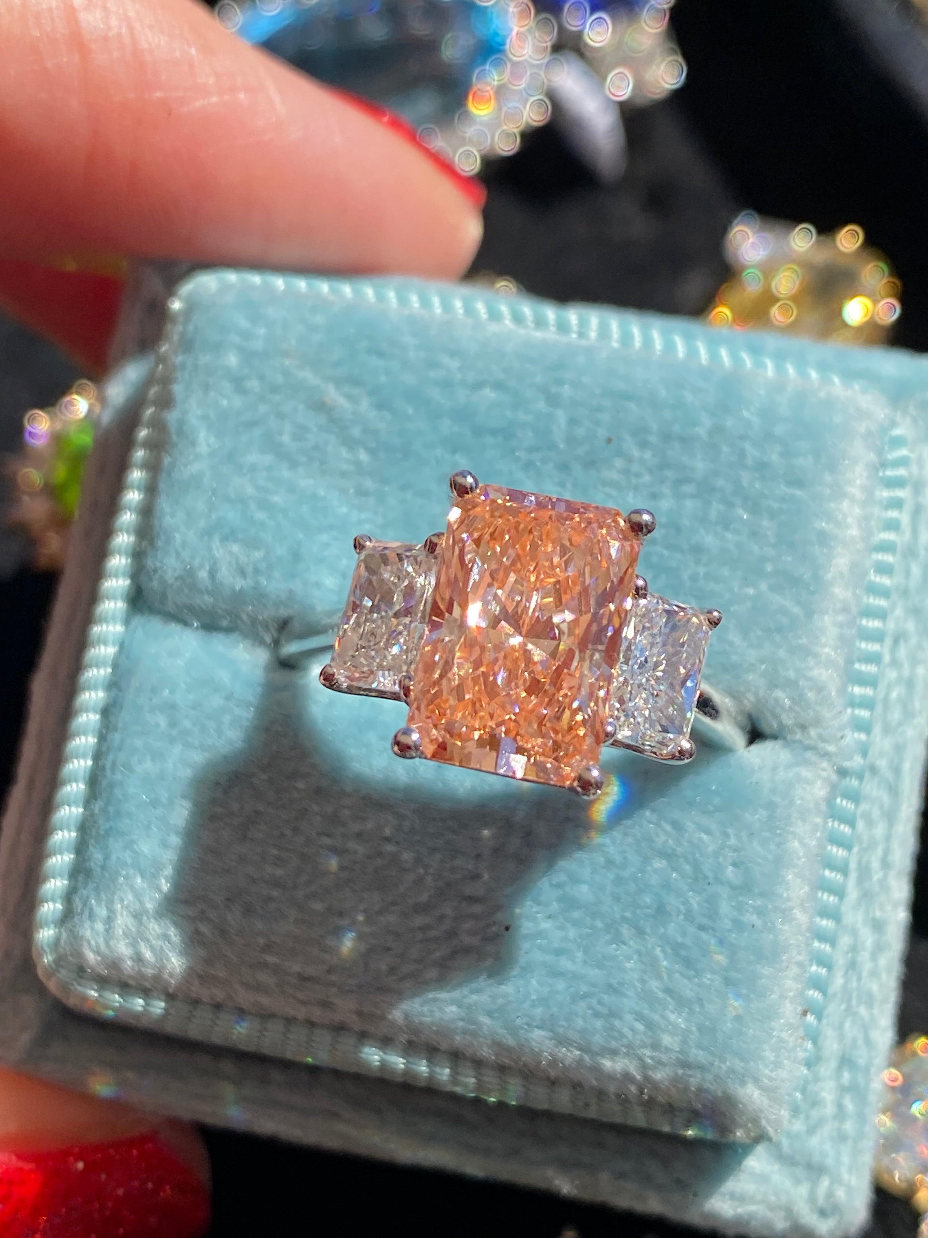 4.12 CTW Fancy Radiant Cut Pink Lab Grown Diamond Graduated Three Stone Ring in Platinum