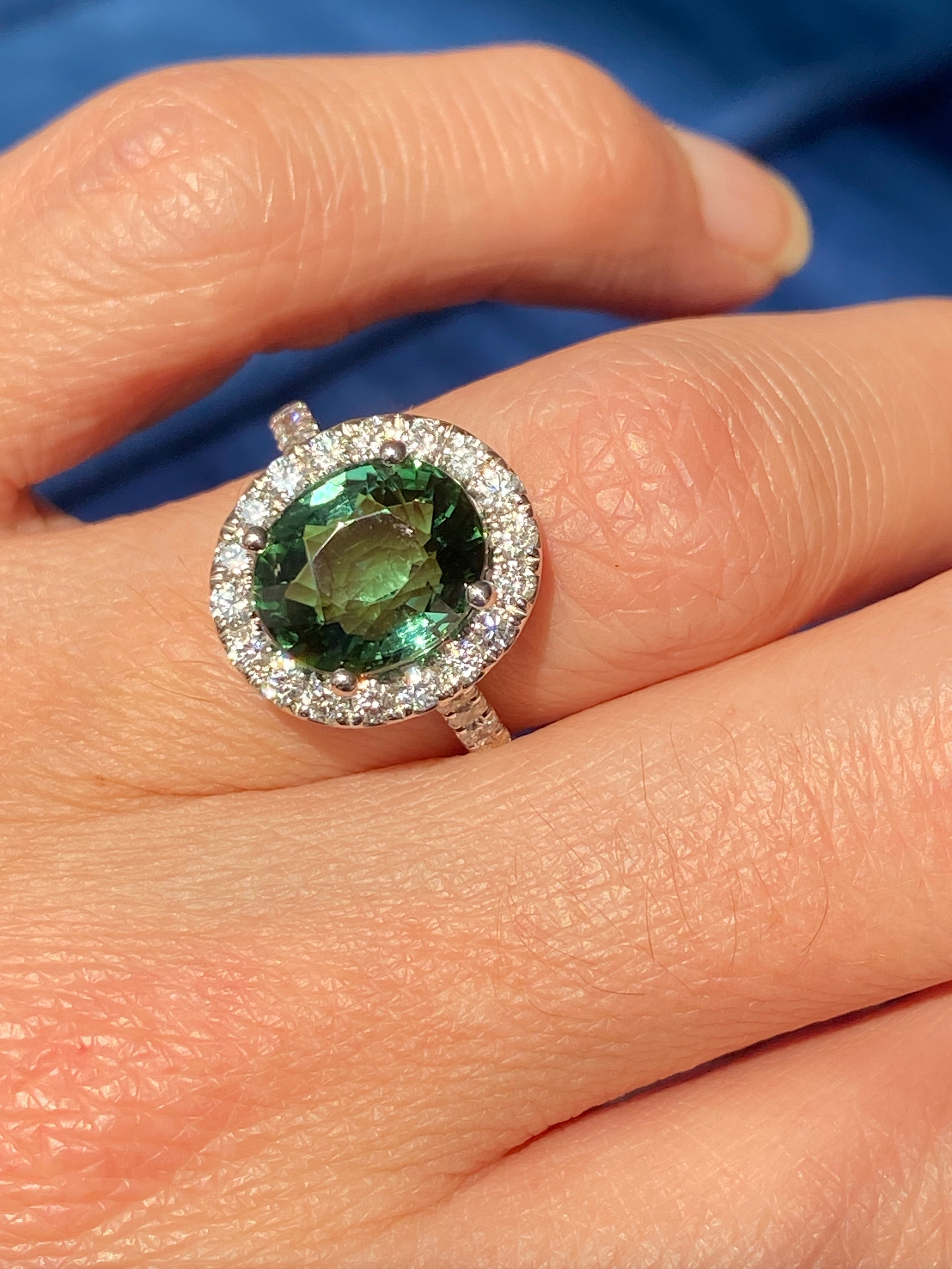5.45 CTW Green Tourmaline and Natural Diamond Halo Ring in Platinum