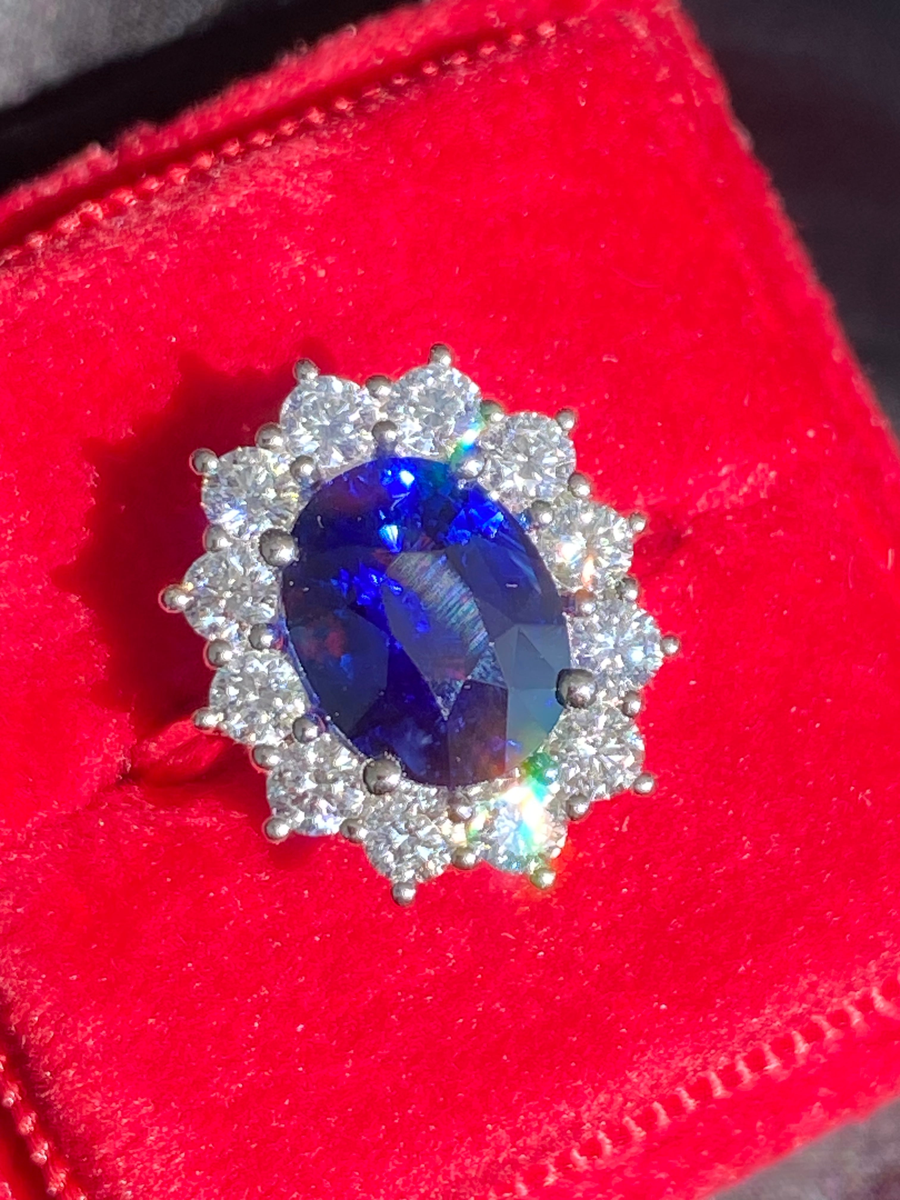 3.17 Carat Blue Ceylon Sapphire and 0.87 CTW Natural Diamond Halo Ring in Platinum